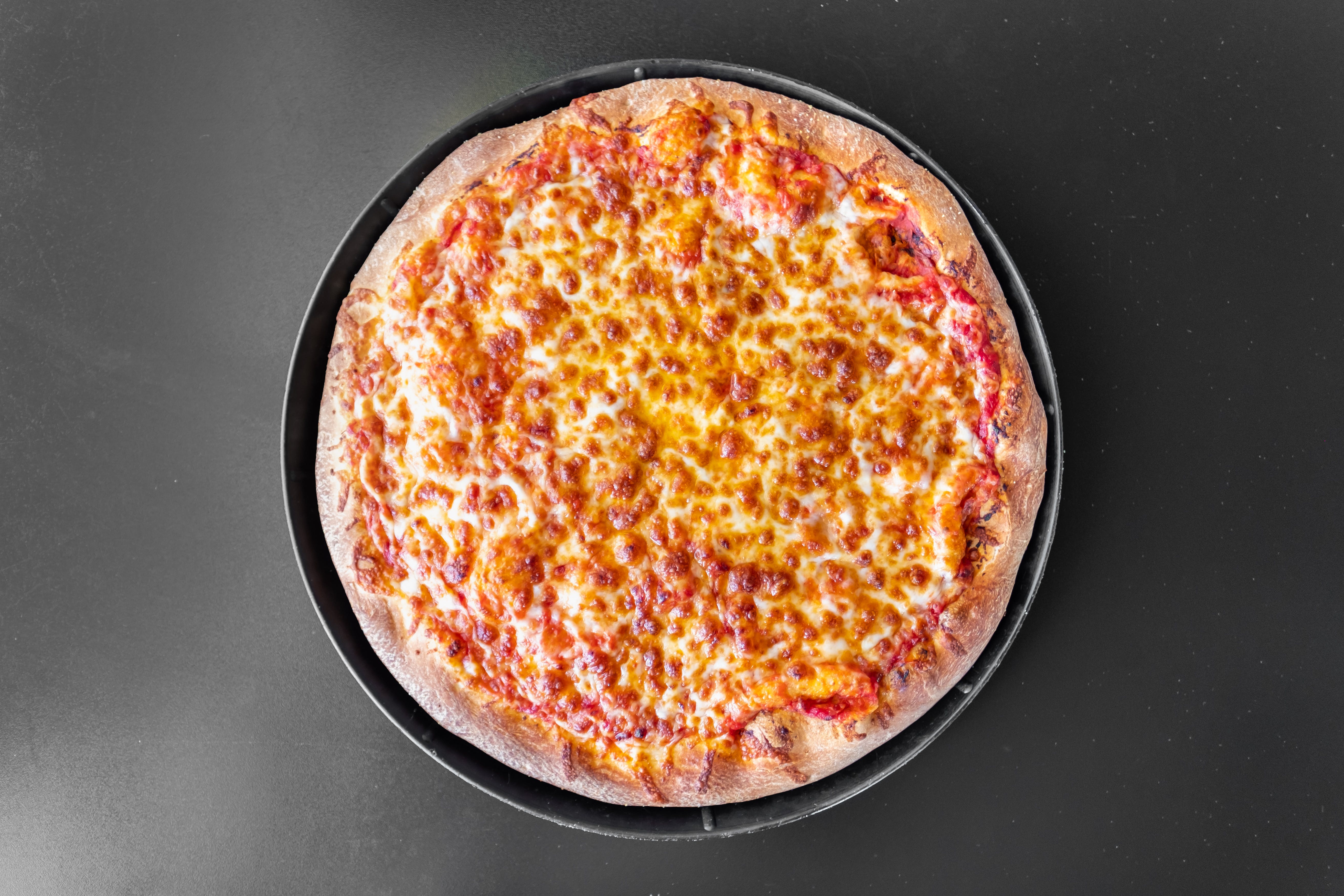 Order Plain Cheese Pizza - Large 14" (Serves 3-6) food online from Neighbors Pizza store, Olivehurst on bringmethat.com
