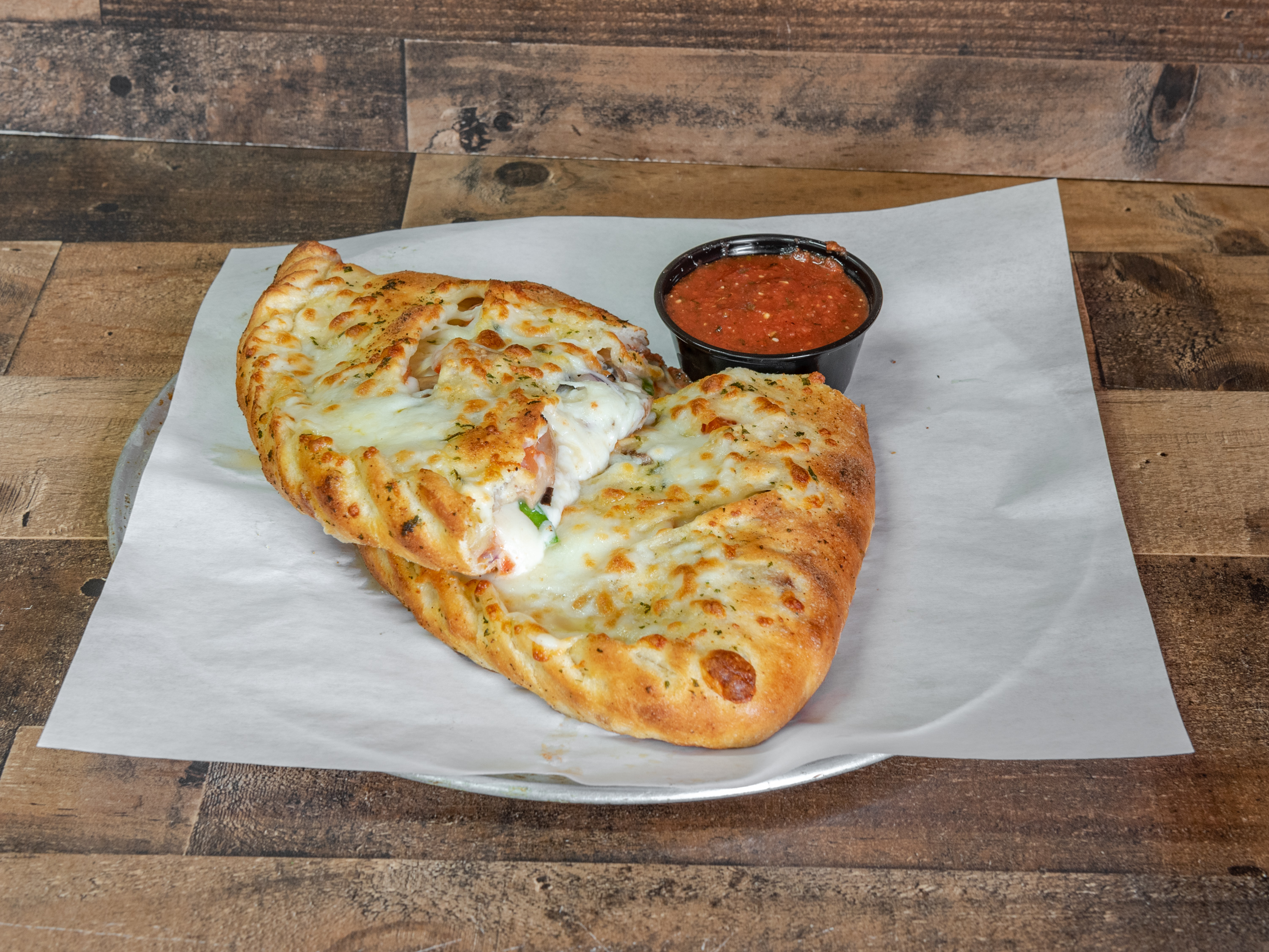 Order Supreme Calzone food online from New York Giant Pizza store, La Mesa on bringmethat.com