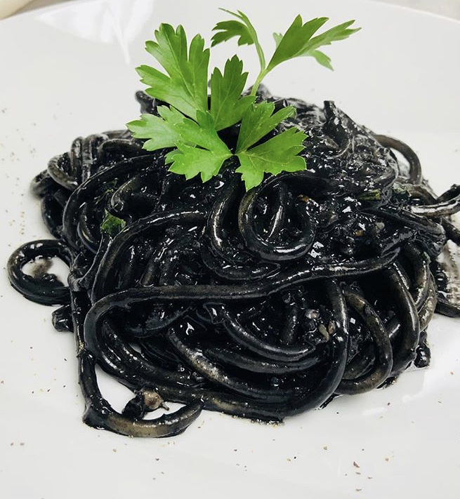 Order Black Linguini al frutti di mare  food online from L'angeletto Restaurant store, New York on bringmethat.com
