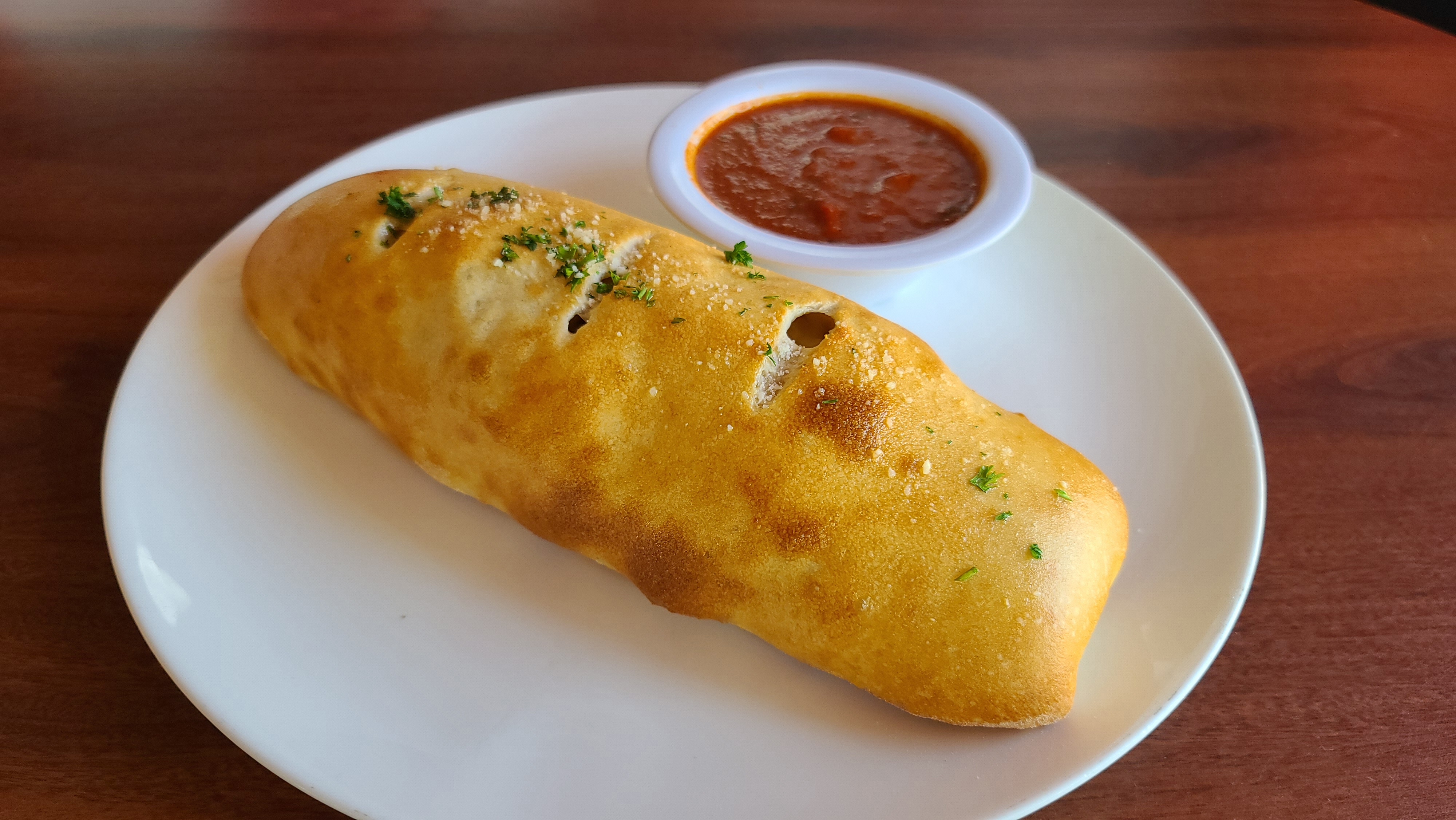 Order Stromboli food online from Italian Cafe store, Irving on bringmethat.com