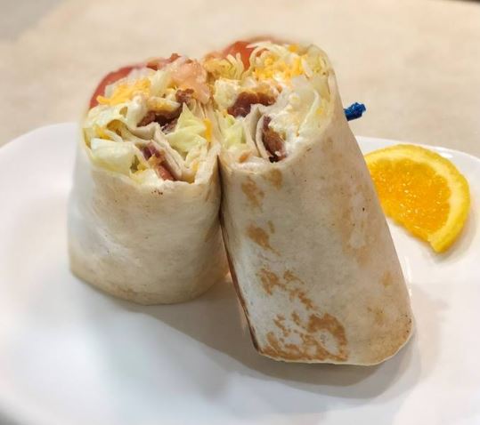 Order Cloaked Chicken Wrap food online from Tick Tock Tavern store, Lafayette on bringmethat.com