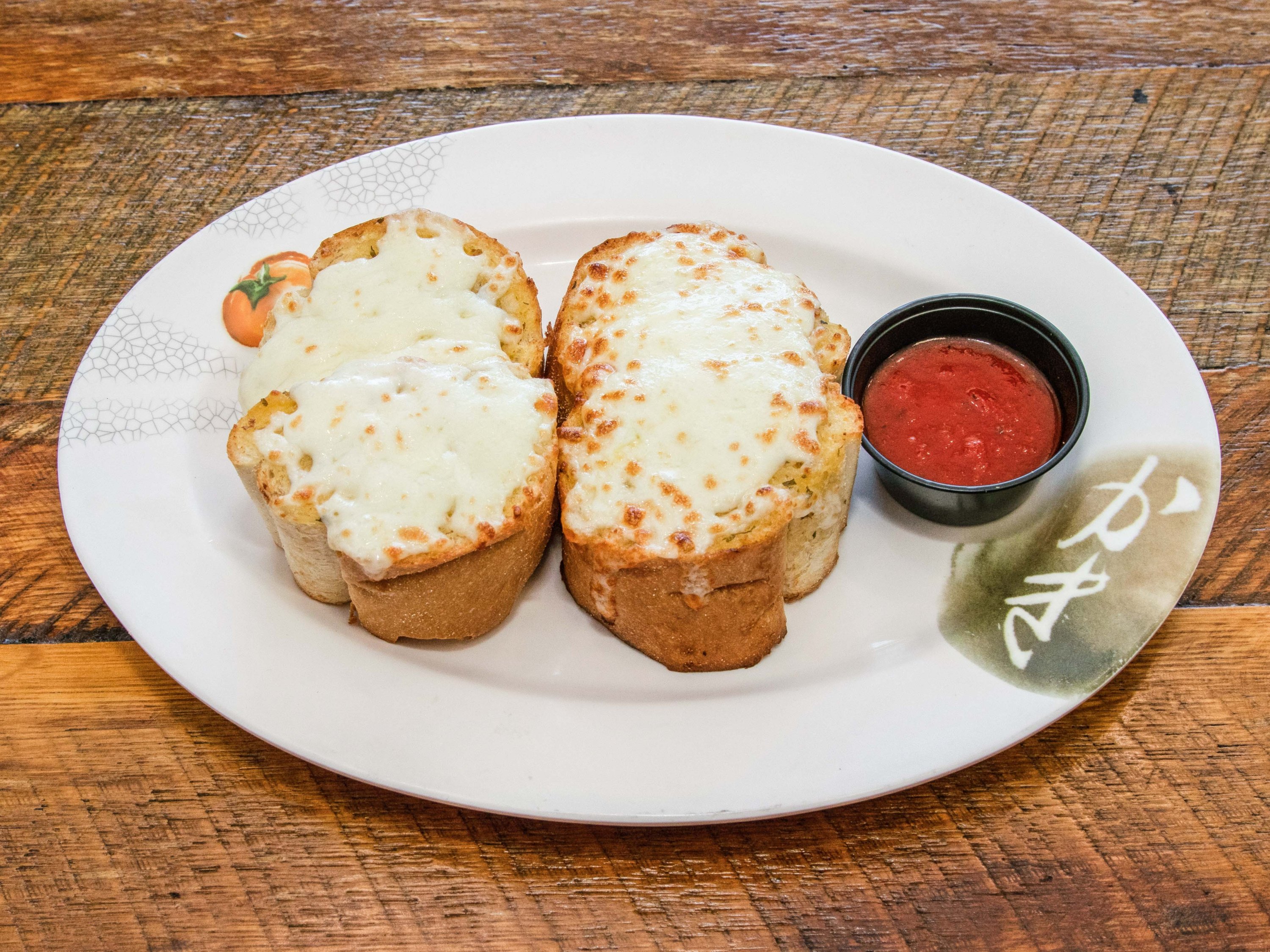 Order Garlic Bread with Cheese food online from Duccinis Pizza store, Falls Church on bringmethat.com