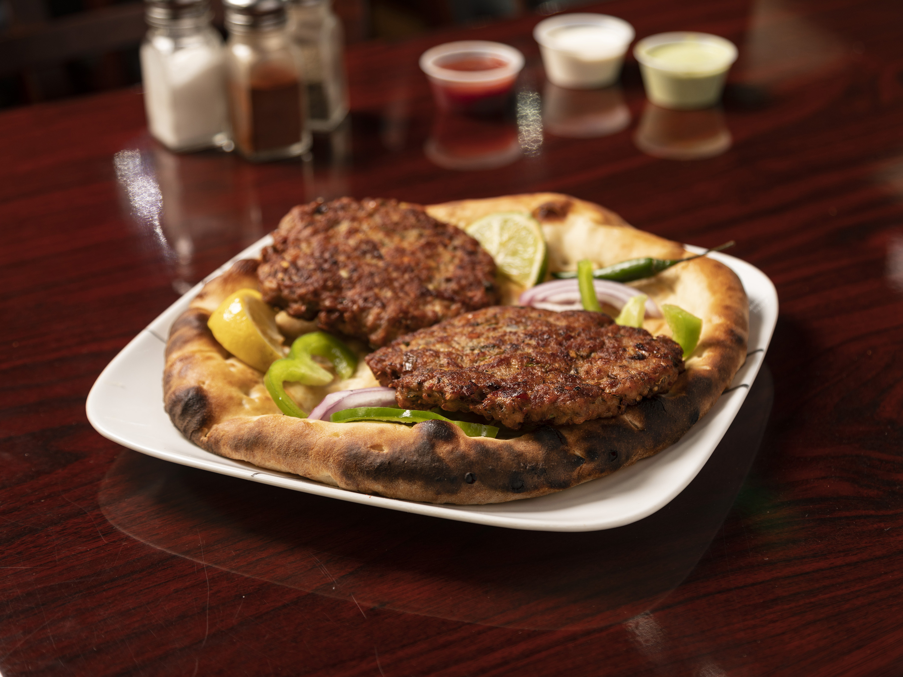 Order 32. Chicken Chapli Naan food online from Peshawri Kebab store, Waltham on bringmethat.com