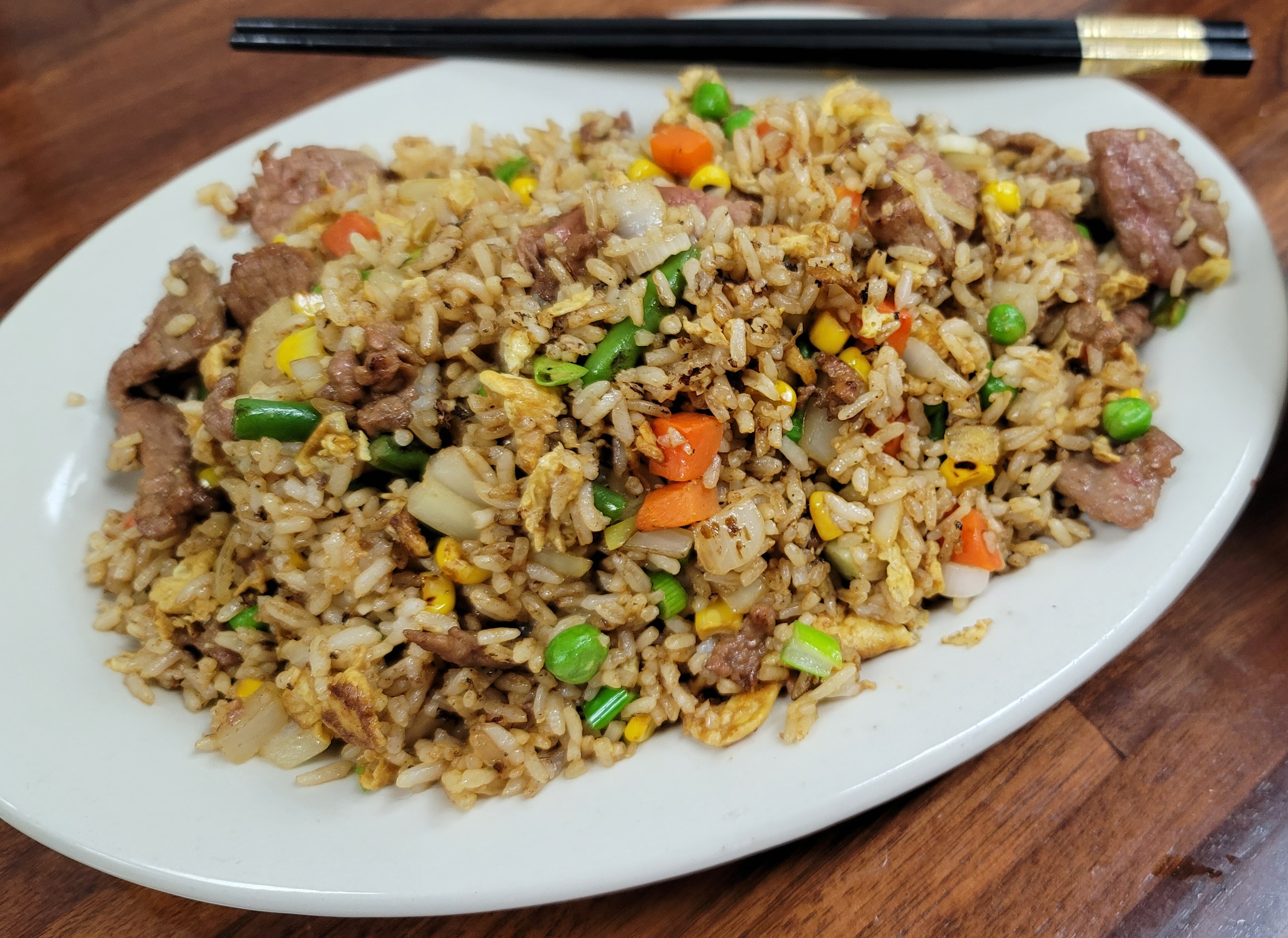 Order Beef Fried Rice food online from China Cafe store, Austin on bringmethat.com