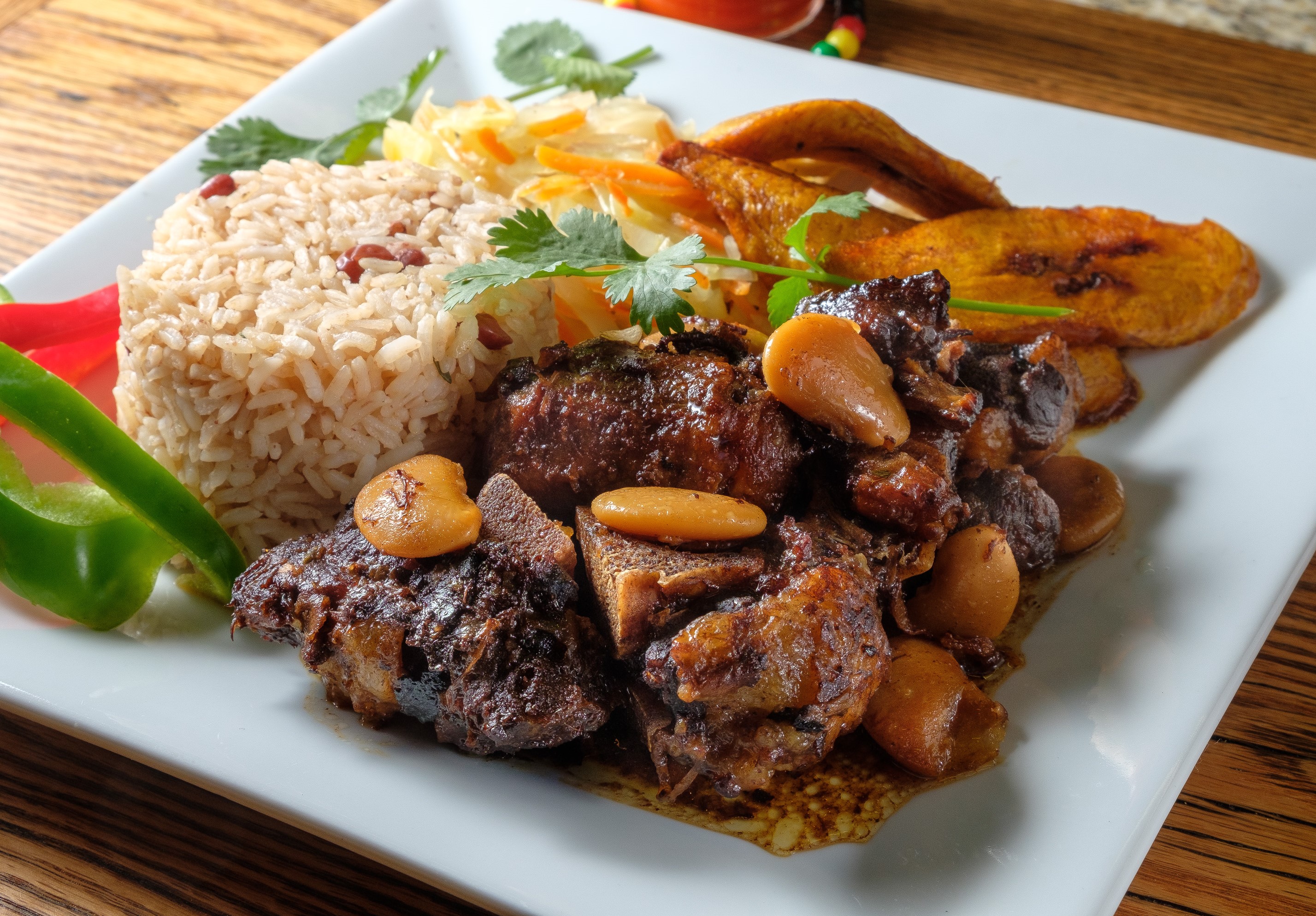 Order Oxtail & Butter Beans food online from Caribbean Paradise store, Washington Township on bringmethat.com