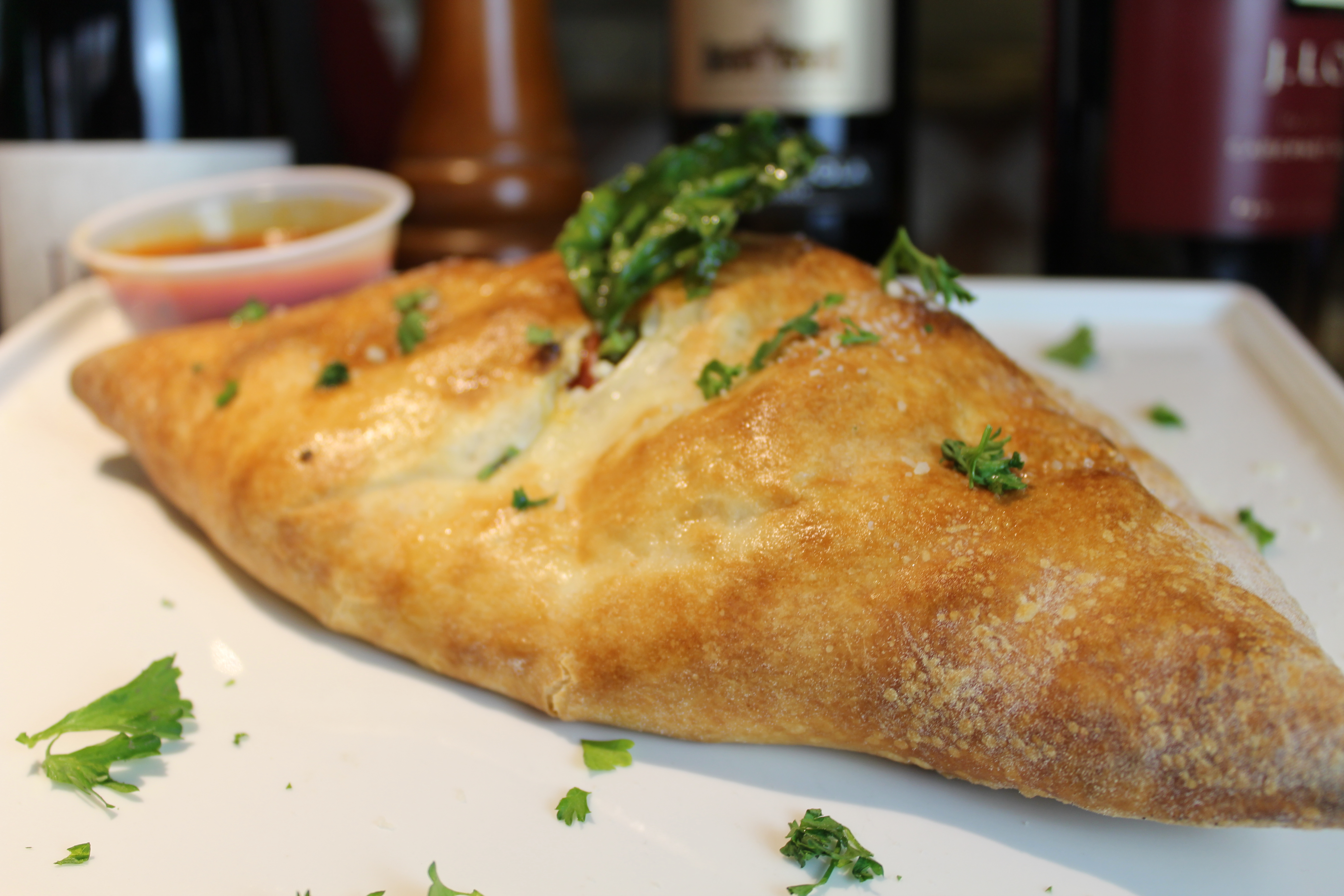 Order Spinach Calzone food online from Elizabeth's Pizza store, Greensboro on bringmethat.com