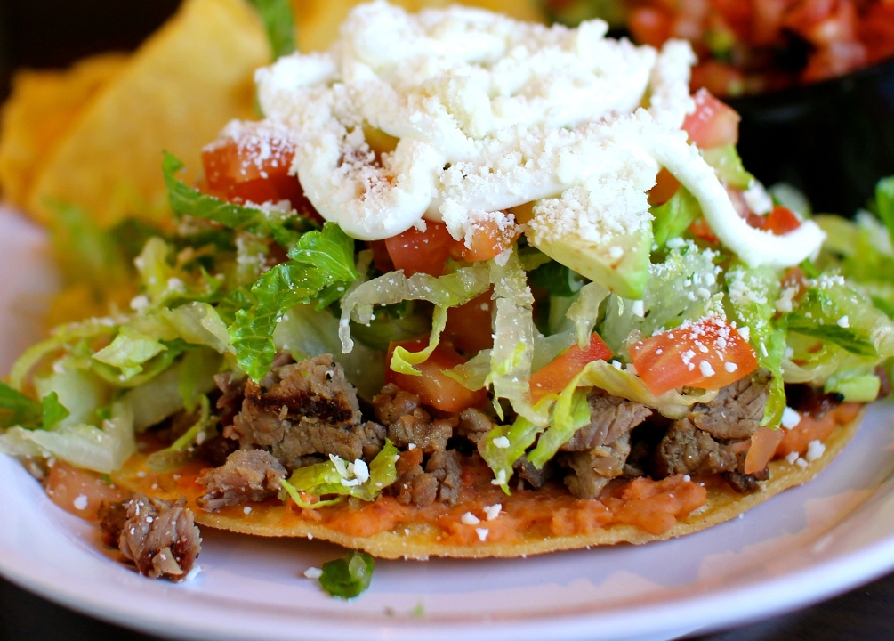 Order Tostada food online from Frijoles & Frescas Grilled Tacos store, Las Vegas on bringmethat.com