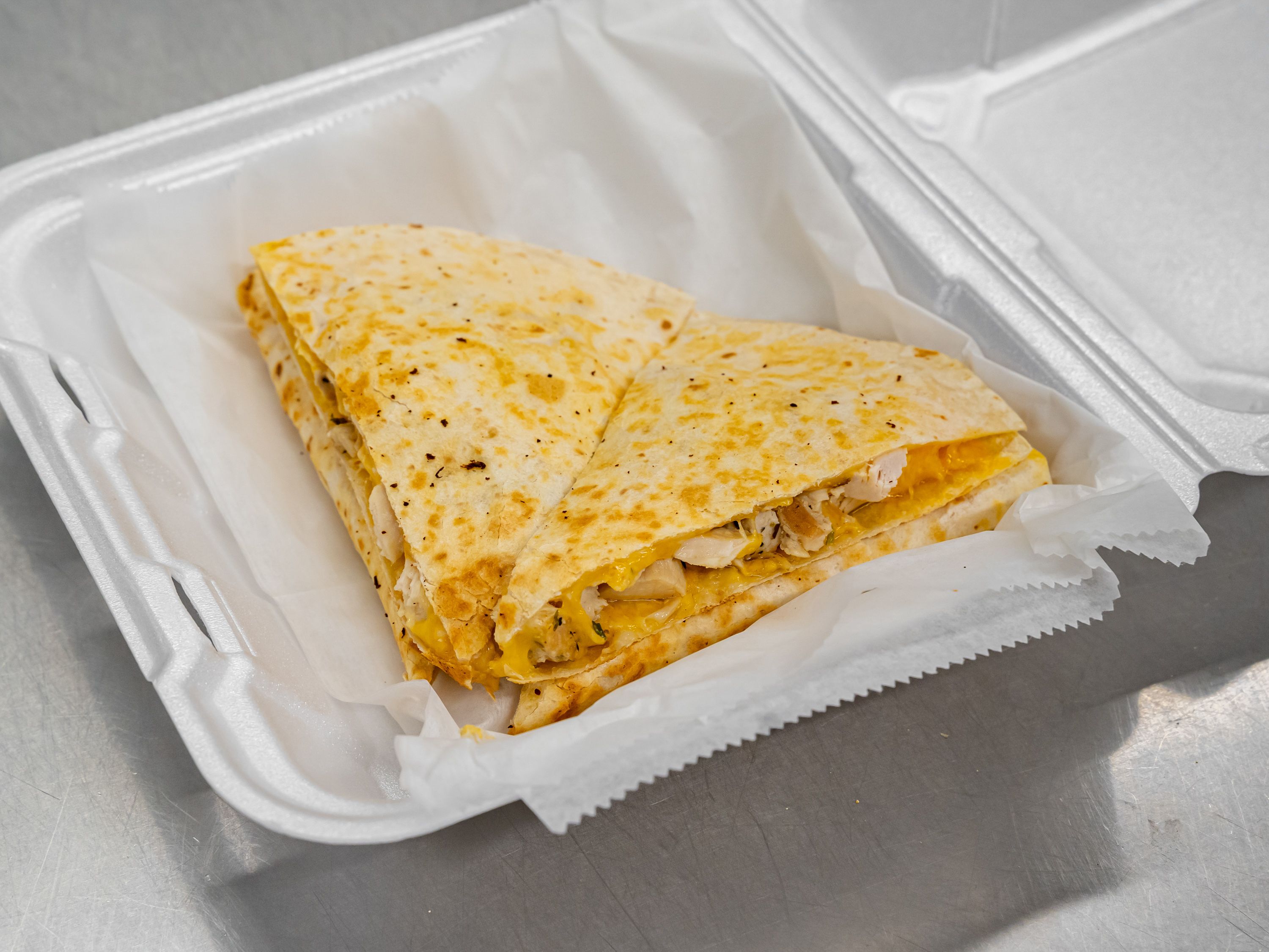 Order Chicken Quesadilla food online from Uncle Tomy's Pizza & Wings store, Philadelphia on bringmethat.com