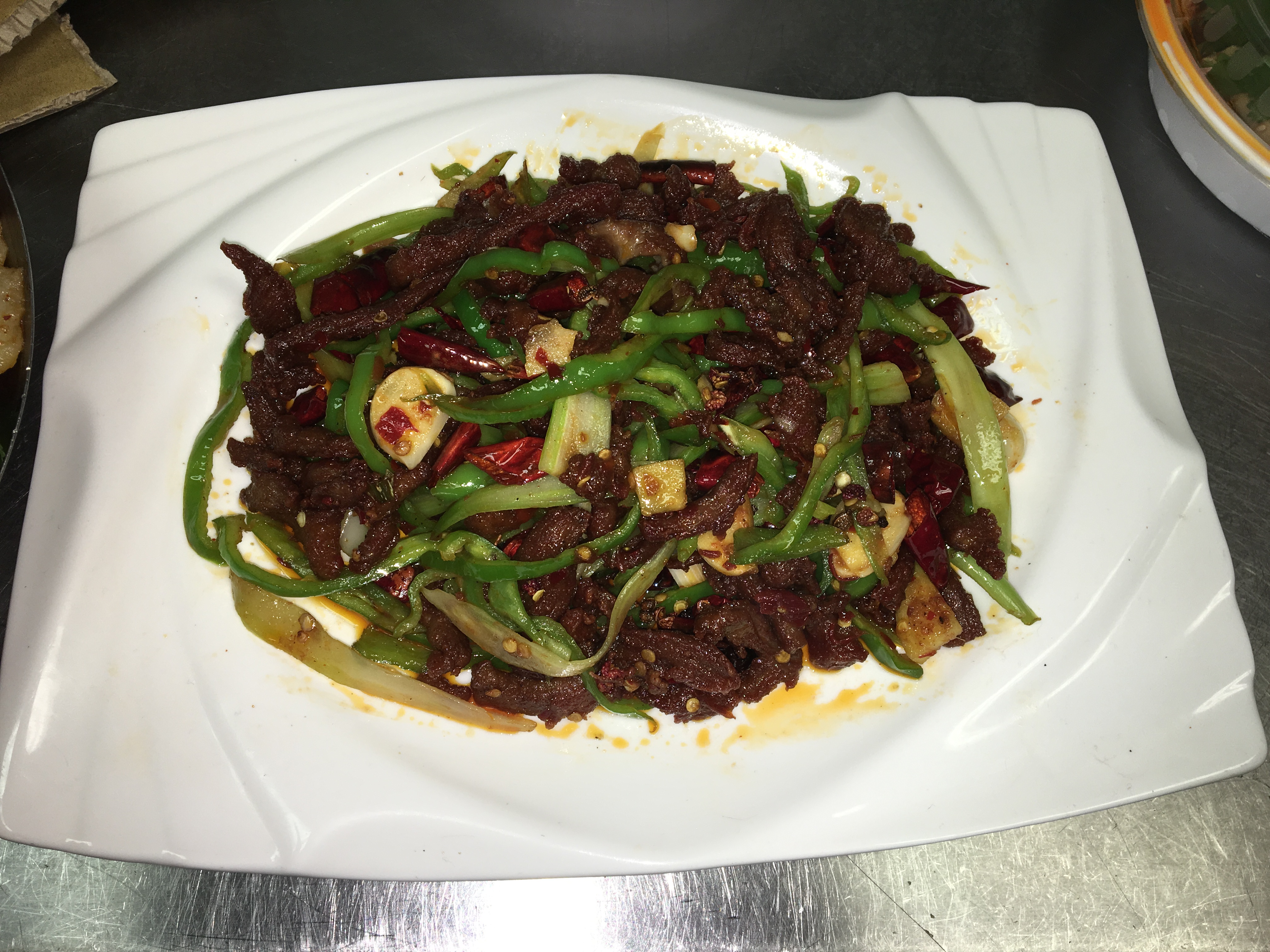 Order F16. Dry Sauteed Shredded Beef 干煸牛肉丝 food online from Red Chili store, Vestal on bringmethat.com