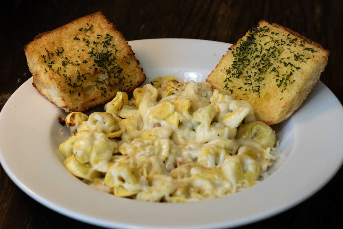 Order Alfredo Tortellini - Individual food online from Straw Hat Pizza Grille store, Milpitas on bringmethat.com