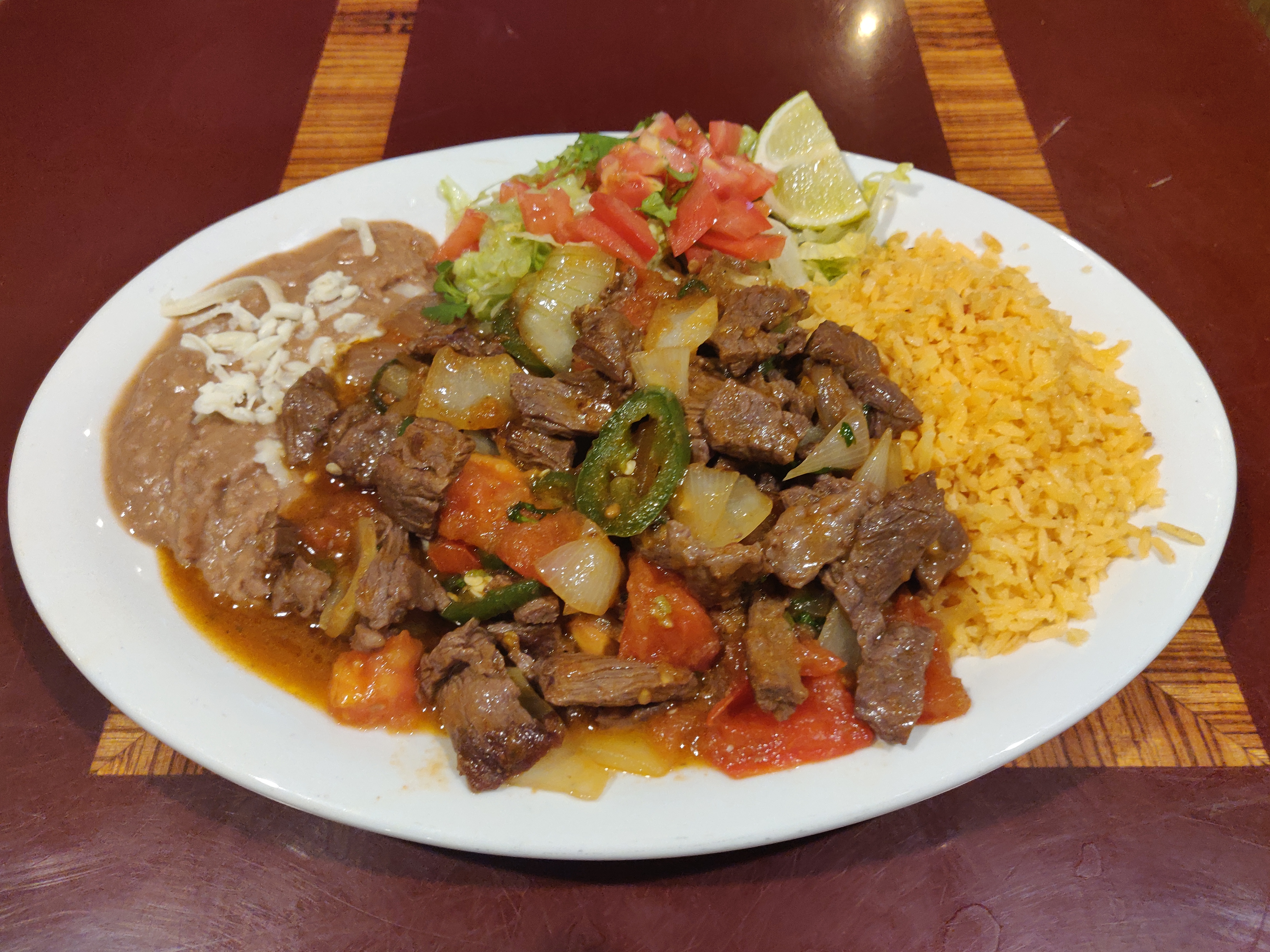 Order Skirt Steak a la Mexicana Dinner food online from El Ranchito store, Chicago on bringmethat.com