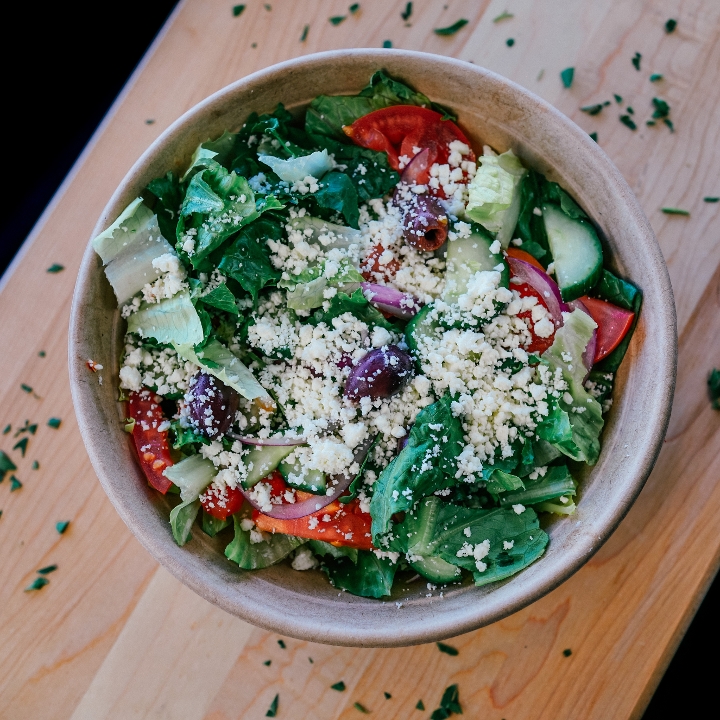 Order Romaine Greek Salad food online from Ariana Kabob & Gyro Bistro store, St. Louis Park on bringmethat.com