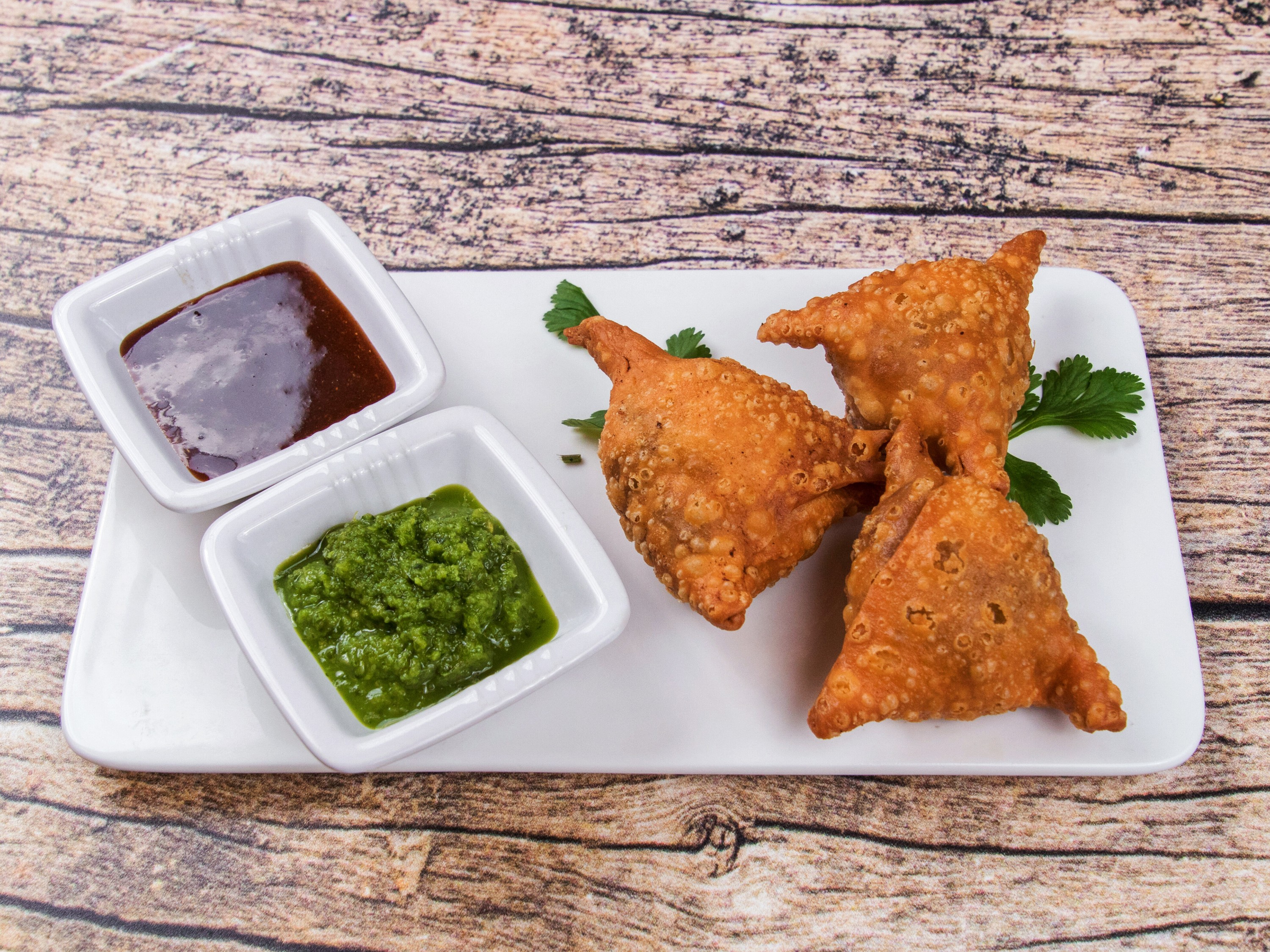 Order Lamb Samosa (2 pieces)  food online from Royal Sweets store, Decatur on bringmethat.com