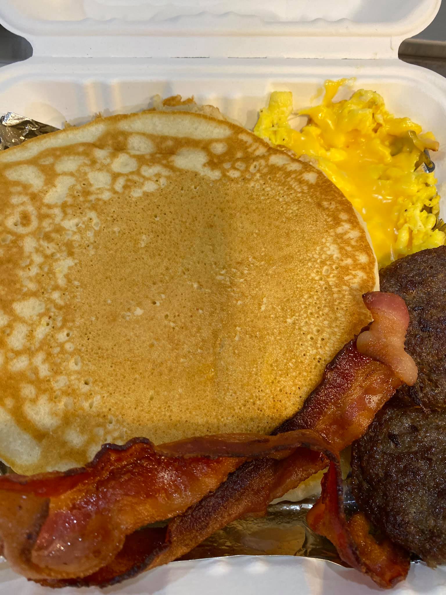 Order 2 Eggs and 2 Piece of Pancakes  or Toast Breakfast Platter food online from Miss Yvonne's store, Edgewater on bringmethat.com