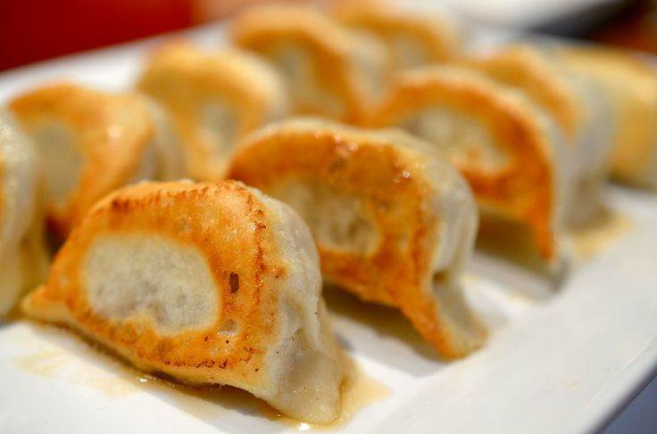 Order A8. Pan Fried Pork Dumplings 煎饺 food online from Kongpao Palace store, Newark on bringmethat.com