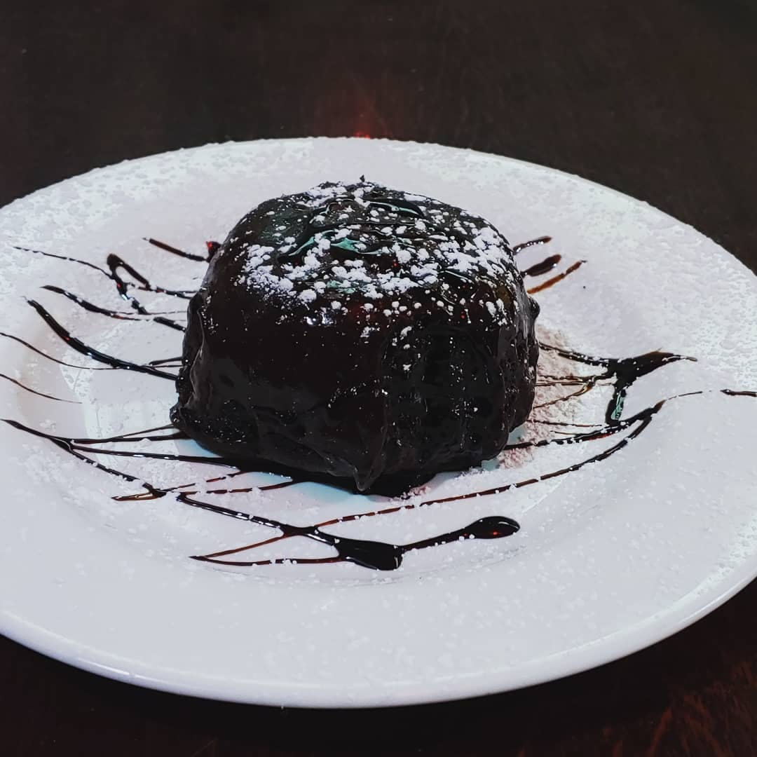 Order Chocolate Lava Cake - Dessert food online from Foschini's Brick Oven Kitchen store, Dumont on bringmethat.com