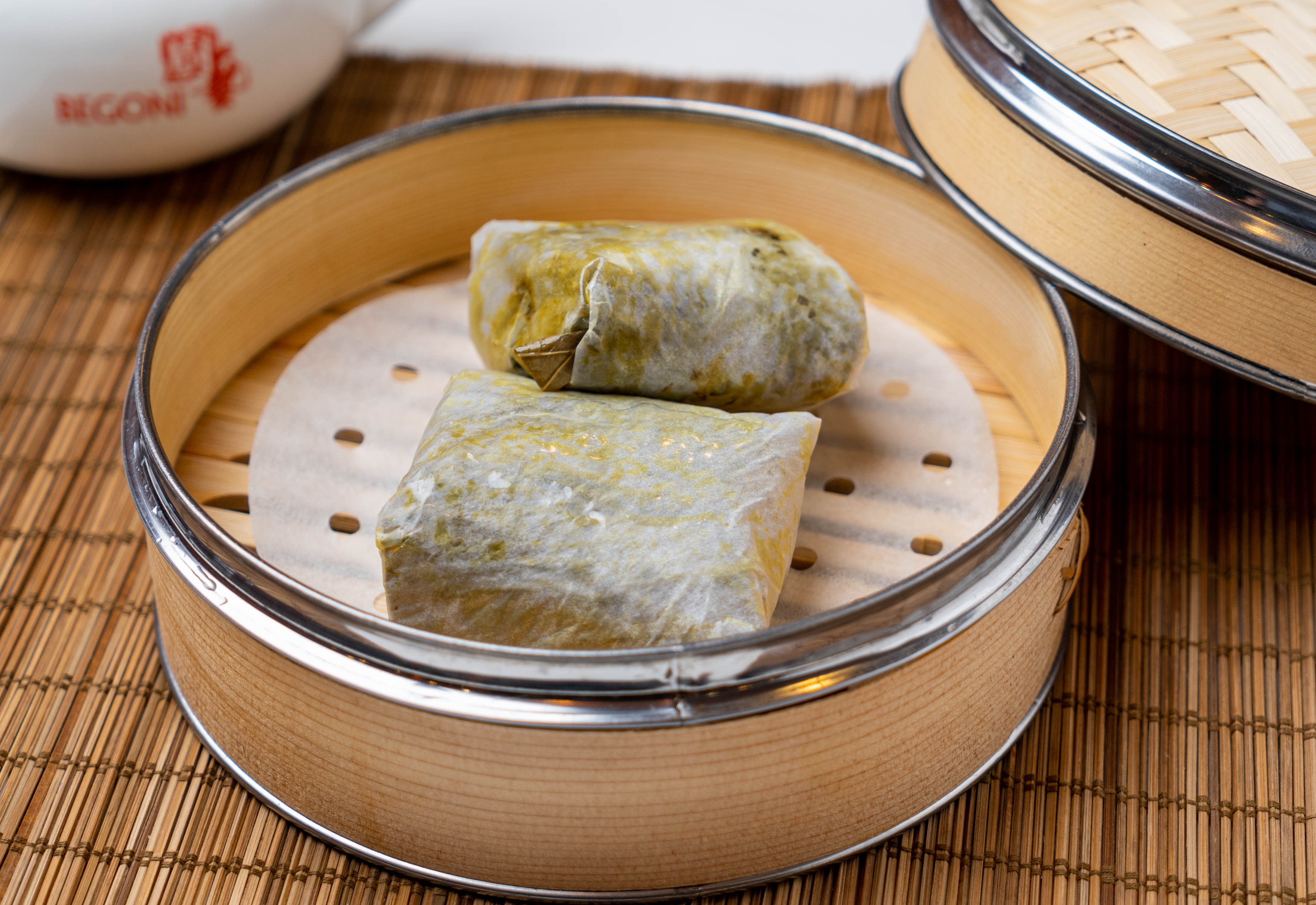 Order CT14. Sticky Rice Wrapped in Lotus Leaf (2)  food online from Begoni Bistro store, San Francisco on bringmethat.com
