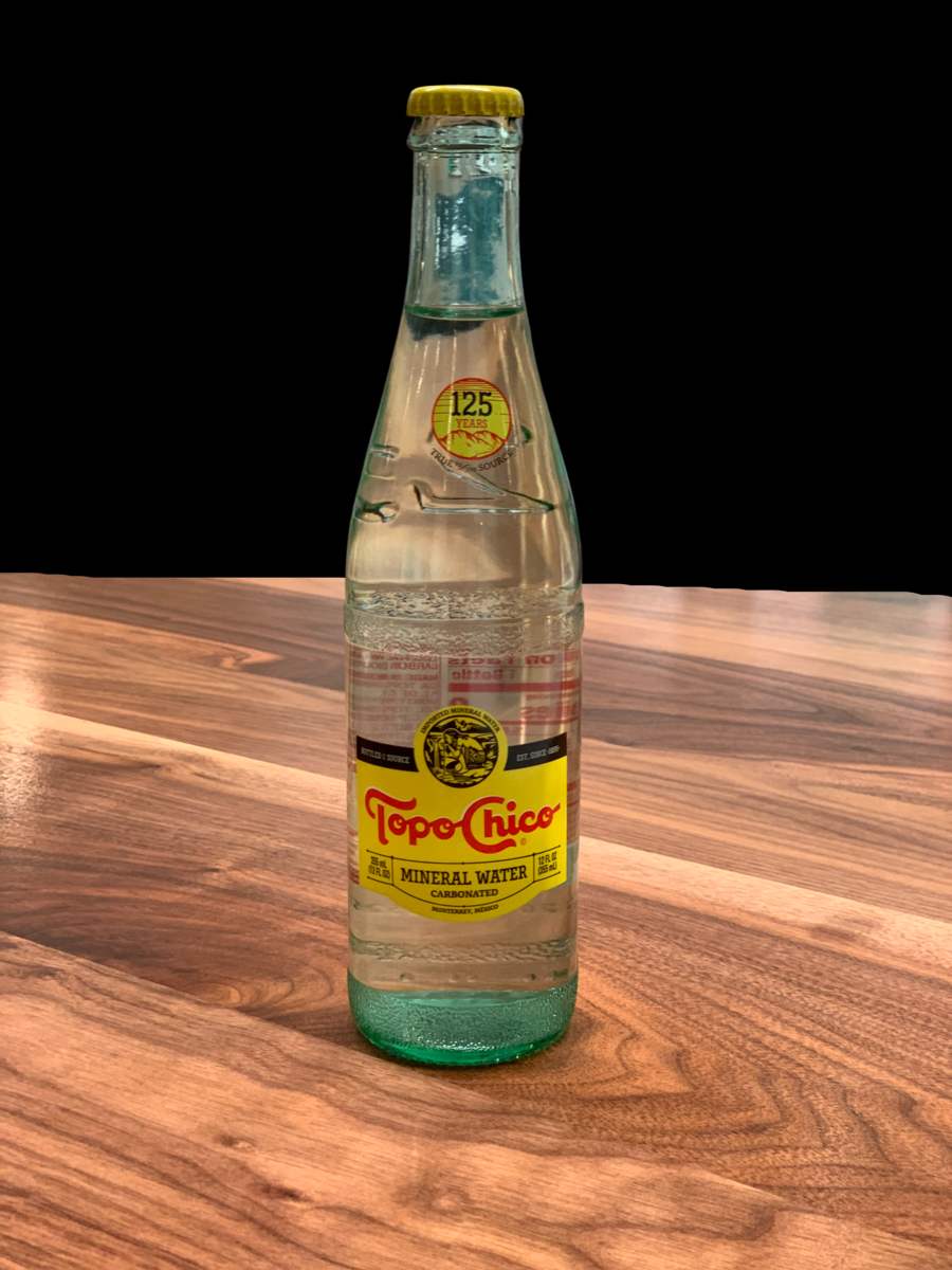 Order Topo Chico Sparkling Water food online from Marin Comfort Kitchen store, San Rafael on bringmethat.com