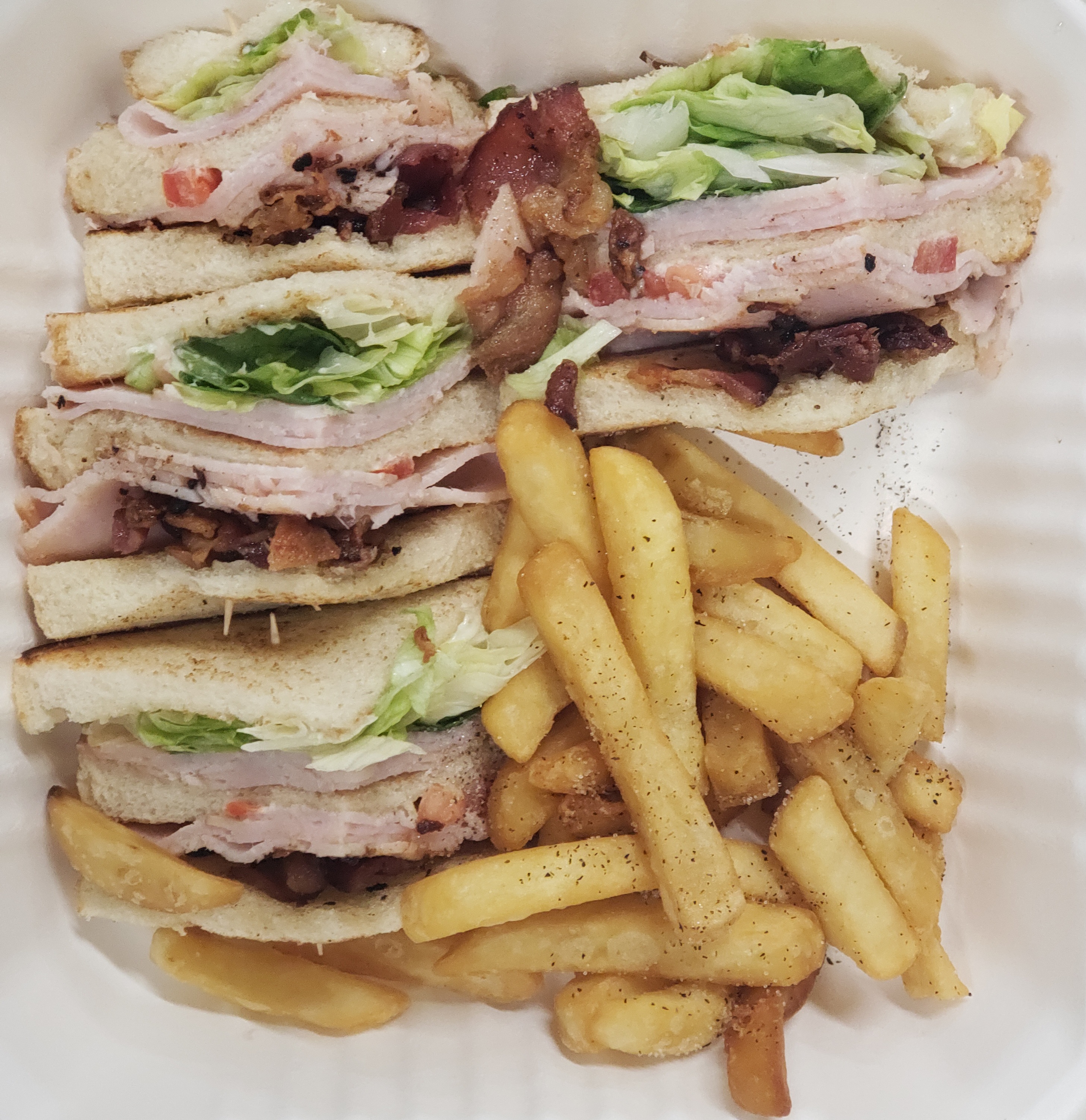 Order Turkey Club Sandwich (With Fries) food online from Ny Fried Chicken Pizza & Subs store, Essex on bringmethat.com