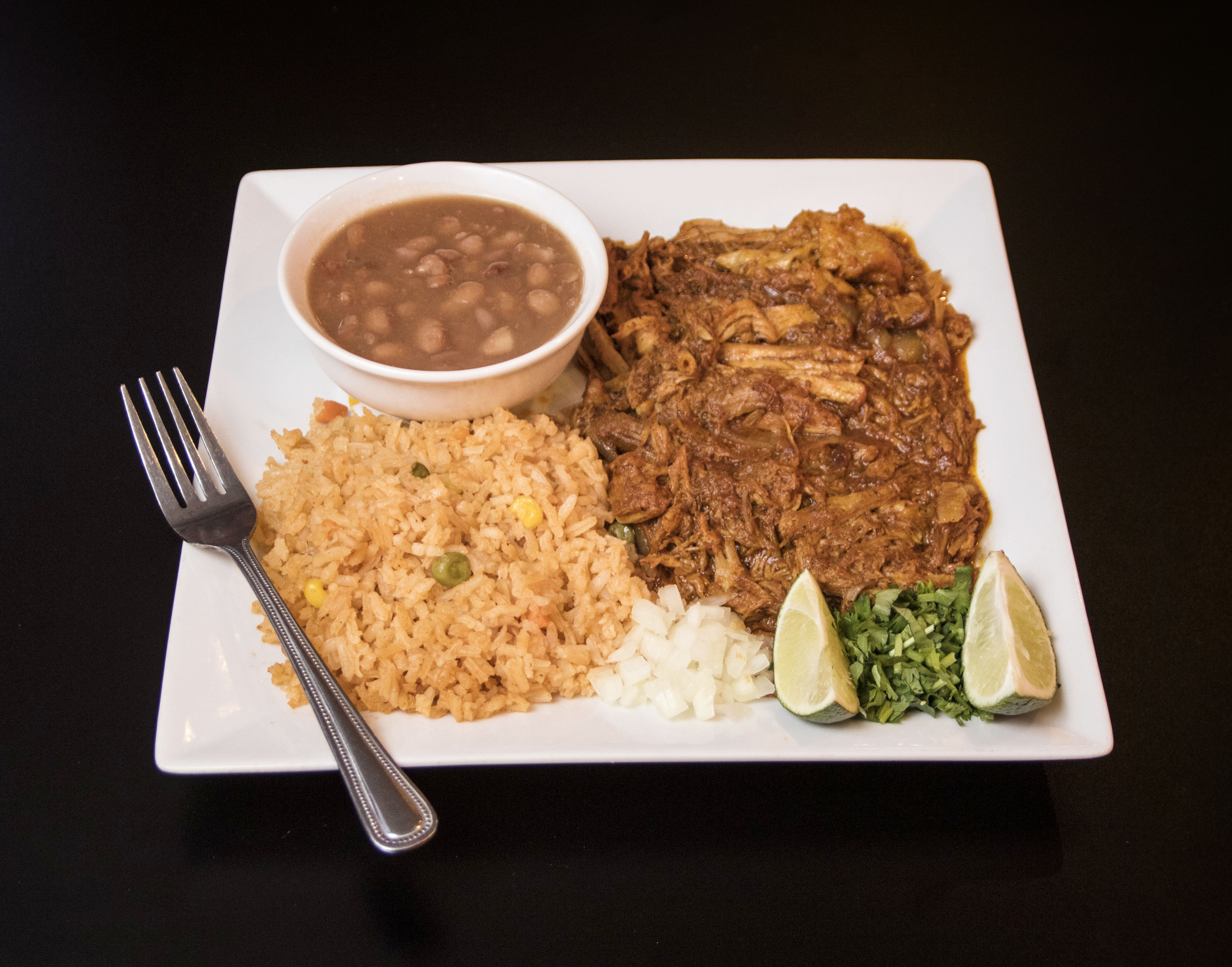 Order Cochinita Pibil food online from Senor Lopez Mexican Restaurant store, Detroit on bringmethat.com