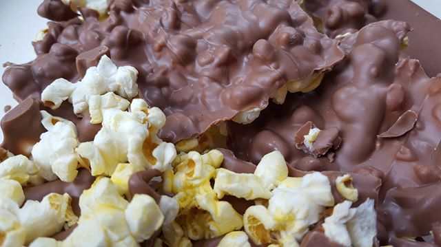 Order Chocolate Covered Popcorn Milk Chocolate food online from St Moritz Chocolatier store, Pittsburgh on bringmethat.com