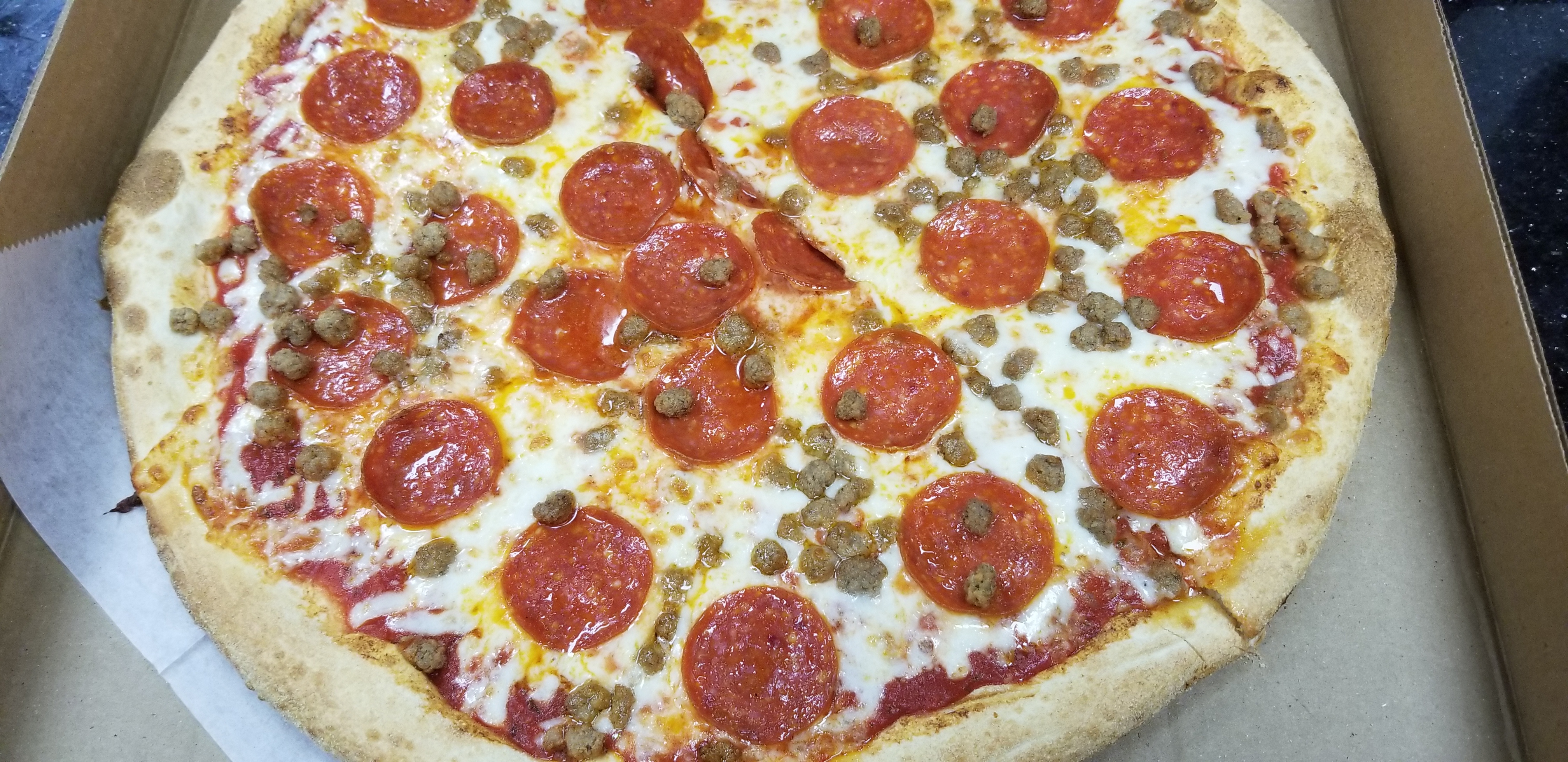 Order Sausage and Pepperoni Pizza food online from Krazy Pizza And Wings store, Brooklyn on bringmethat.com