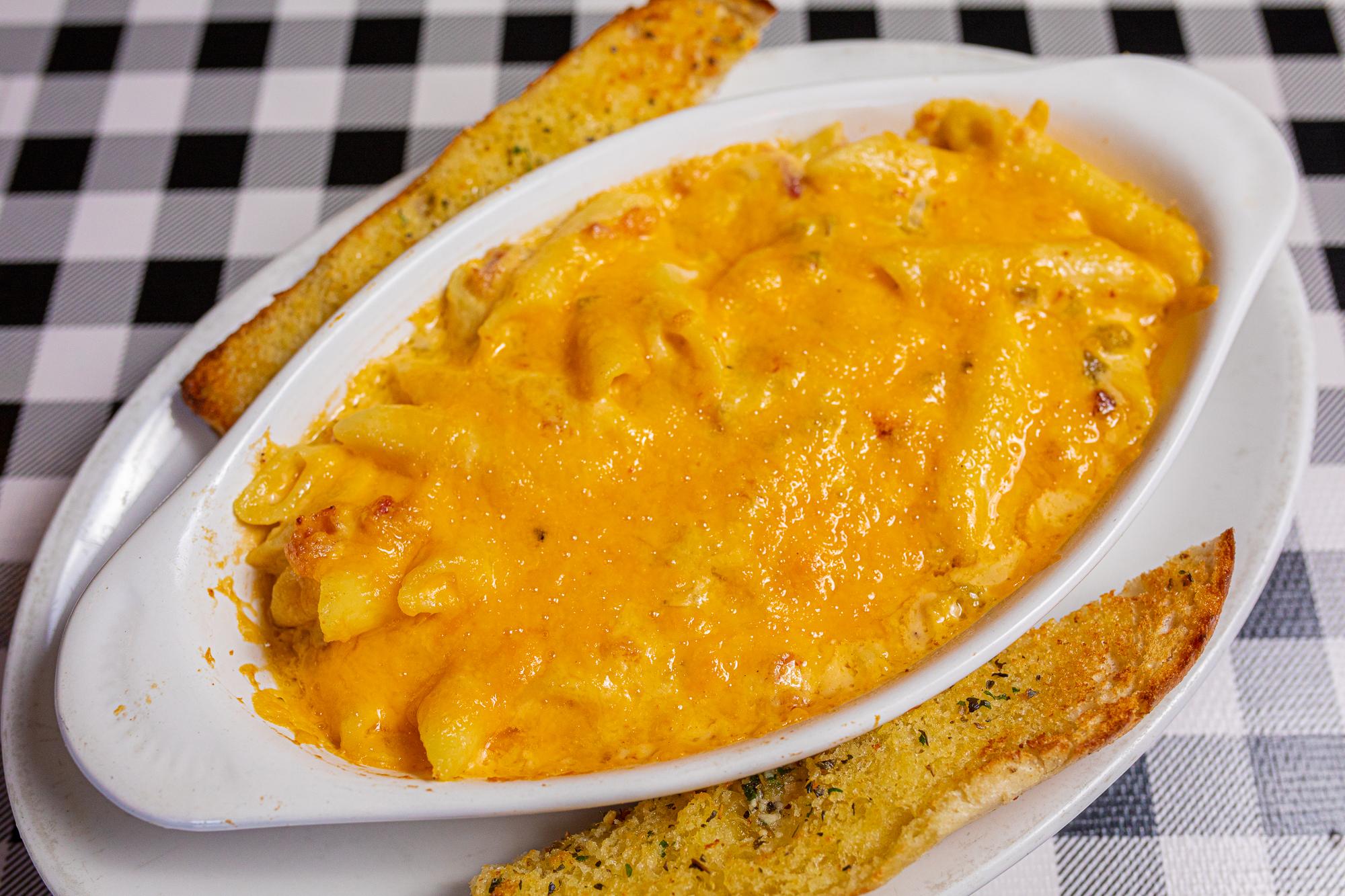 Order JALAPENO BACON MAC & CHEESE food online from Paninos store, Fort Collins on bringmethat.com