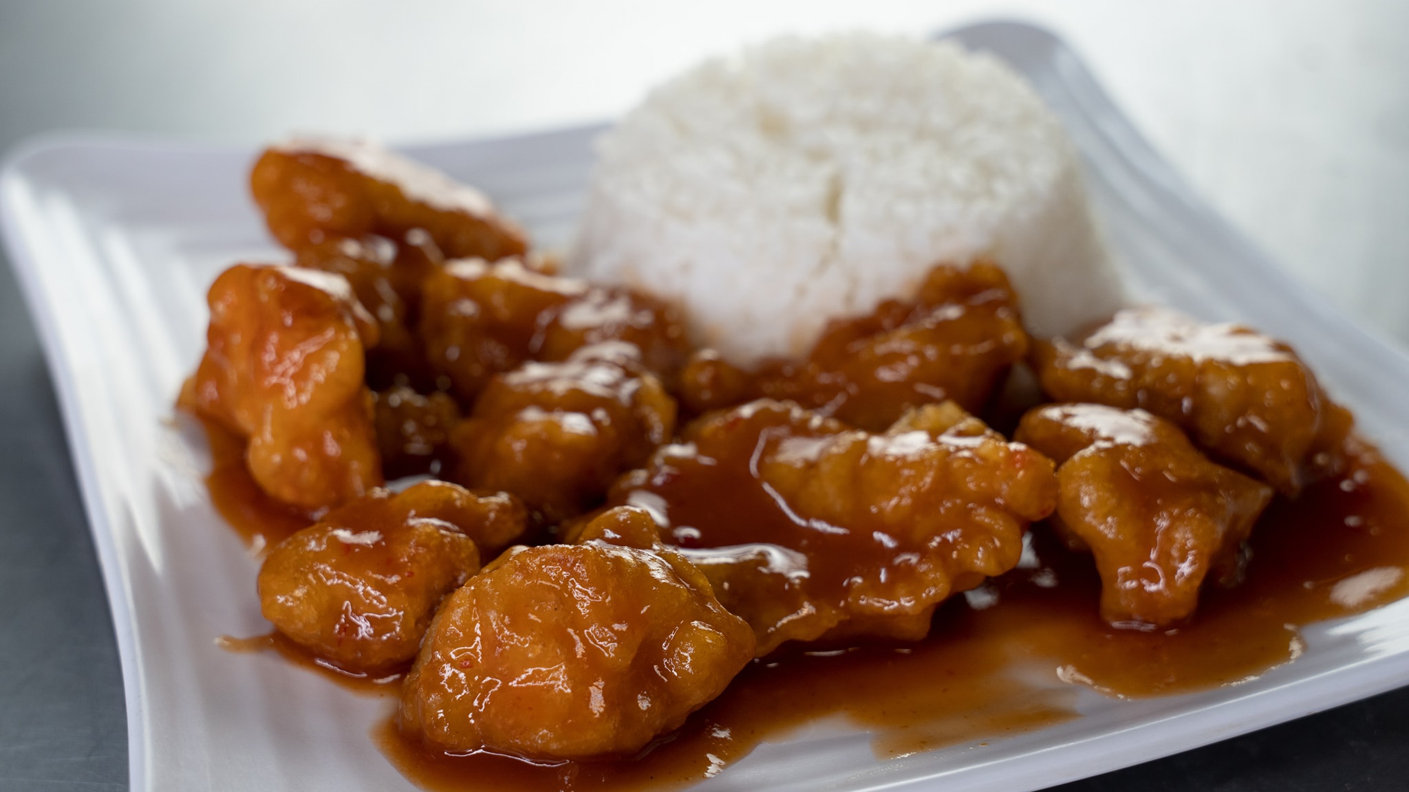 Order Orange Chicken food online from Green Panda Cafe store, Provo on bringmethat.com