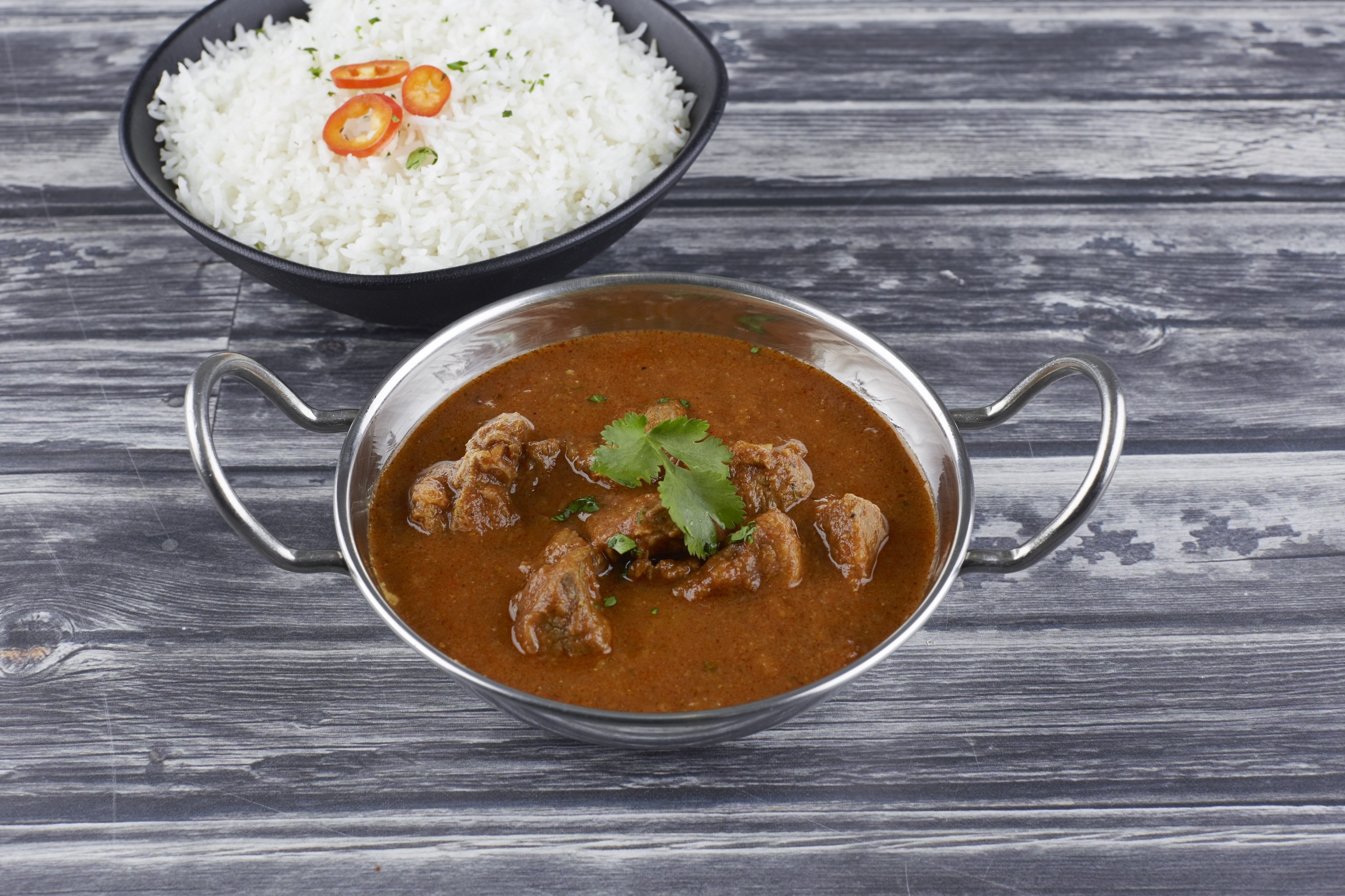 Order Lamb Curry food online from Everest Curry Kitchen store, Sandy on bringmethat.com