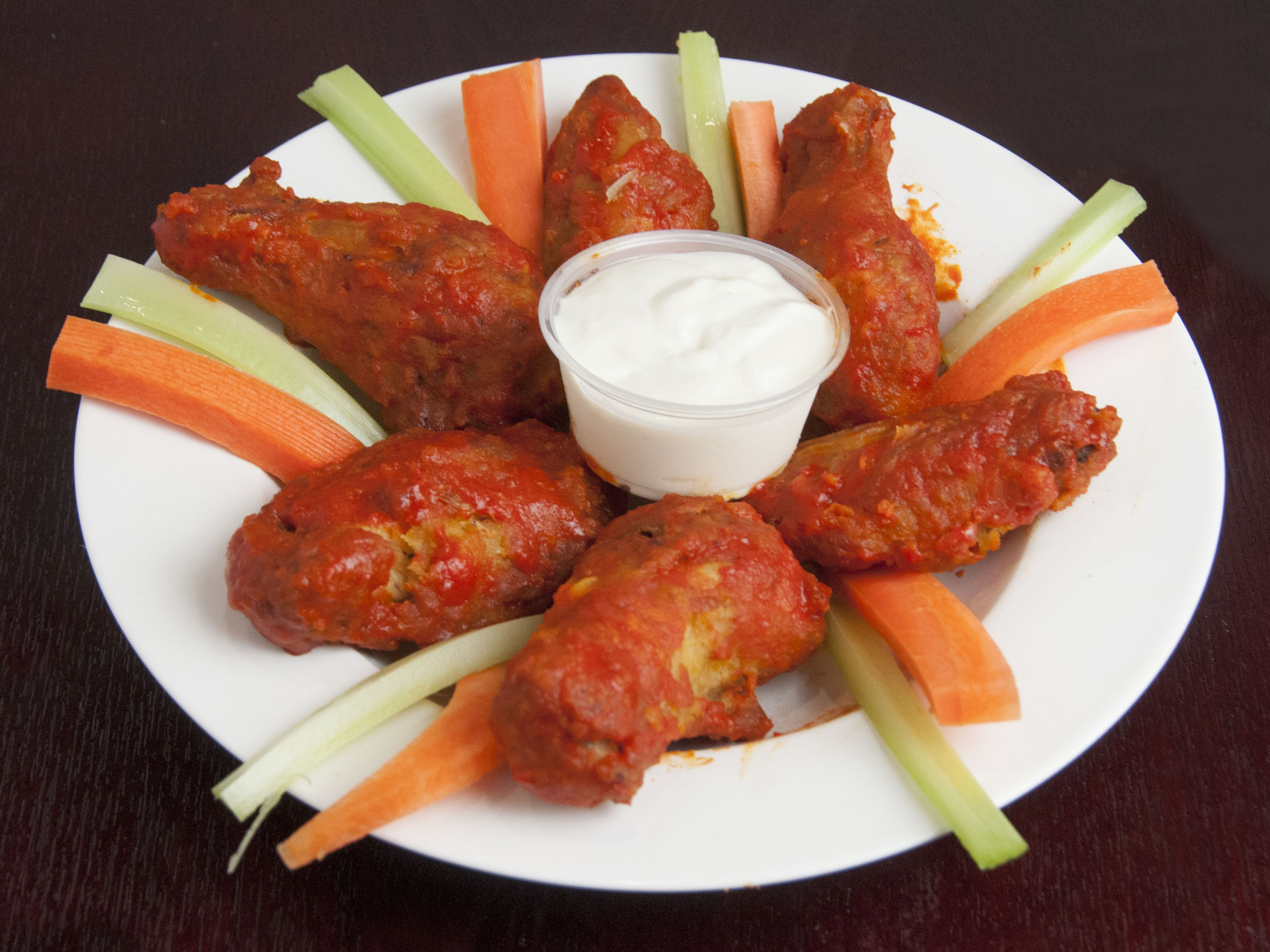 Order Buffalo Wings food online from Pizza Stop store, New York on bringmethat.com