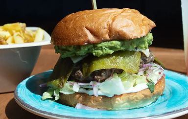 Order Guac You Know About Green Chili Burger food online from Divine Bovine Burgers store, Tucson on bringmethat.com