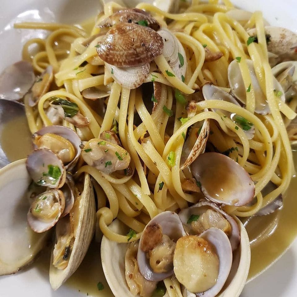Order Linguine with White Clam Sauce - Pasta food online from Table 42 store, Dover on bringmethat.com