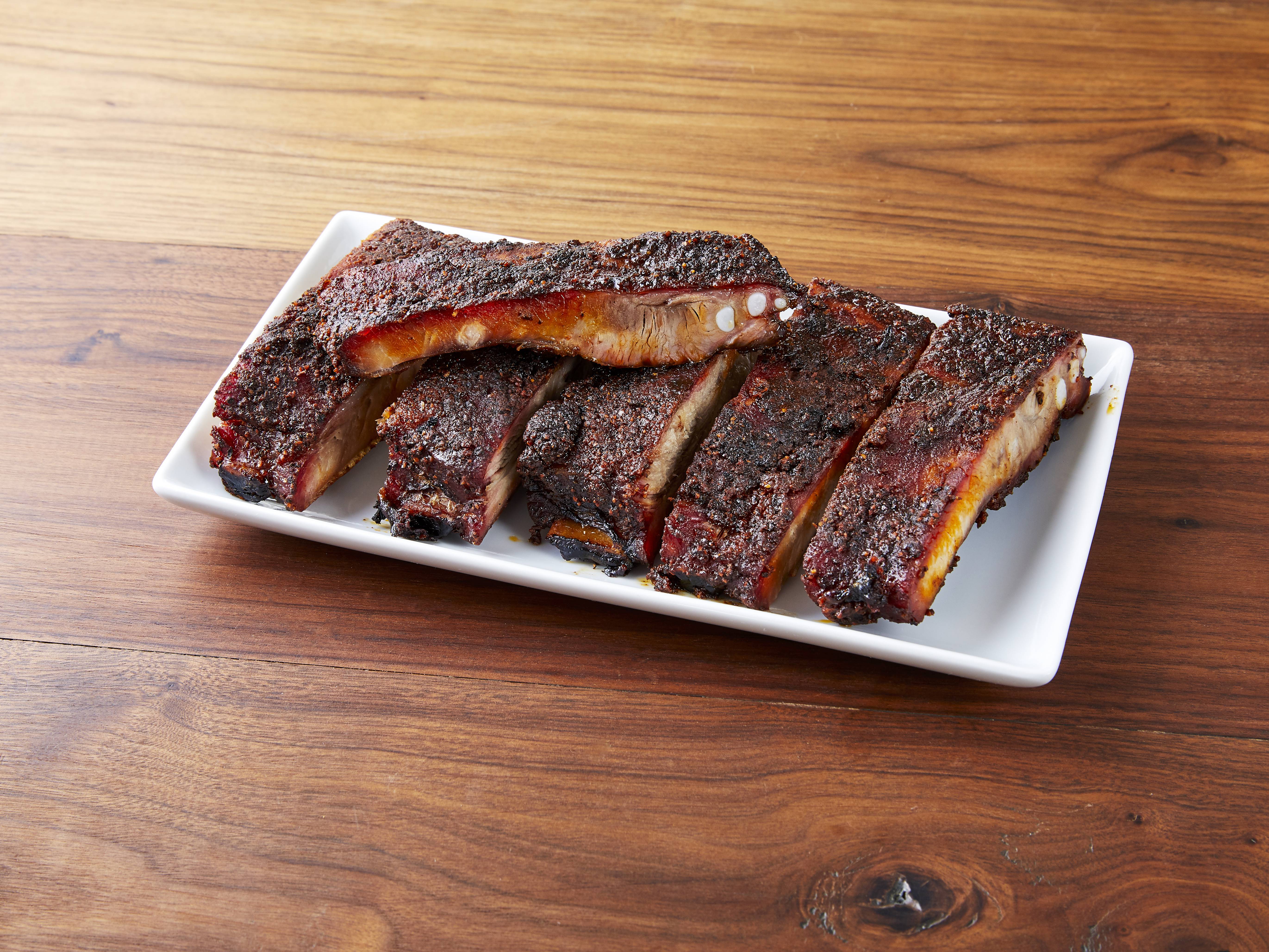Order St. Louis Spare Ribs food online from Woodpile Bbq Shack store, Clawson on bringmethat.com