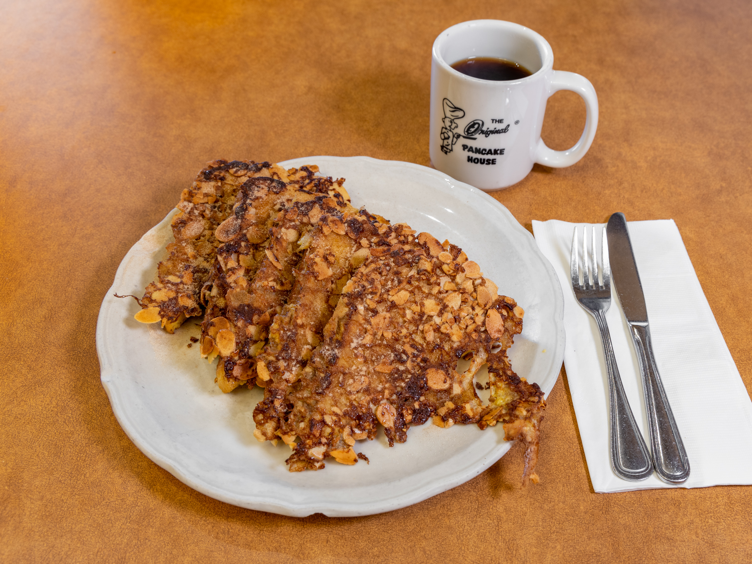 Order Cinnamon Almond French Toast food online from The Original Pancake House store, Orange on bringmethat.com