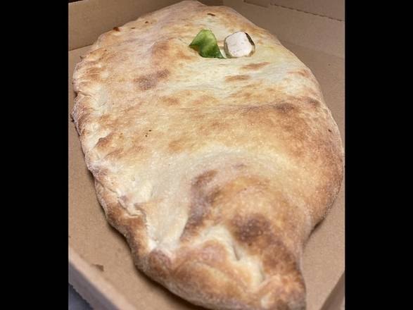 Order Veggie Calzone food online from North End Pizza store, Las Vegas on bringmethat.com