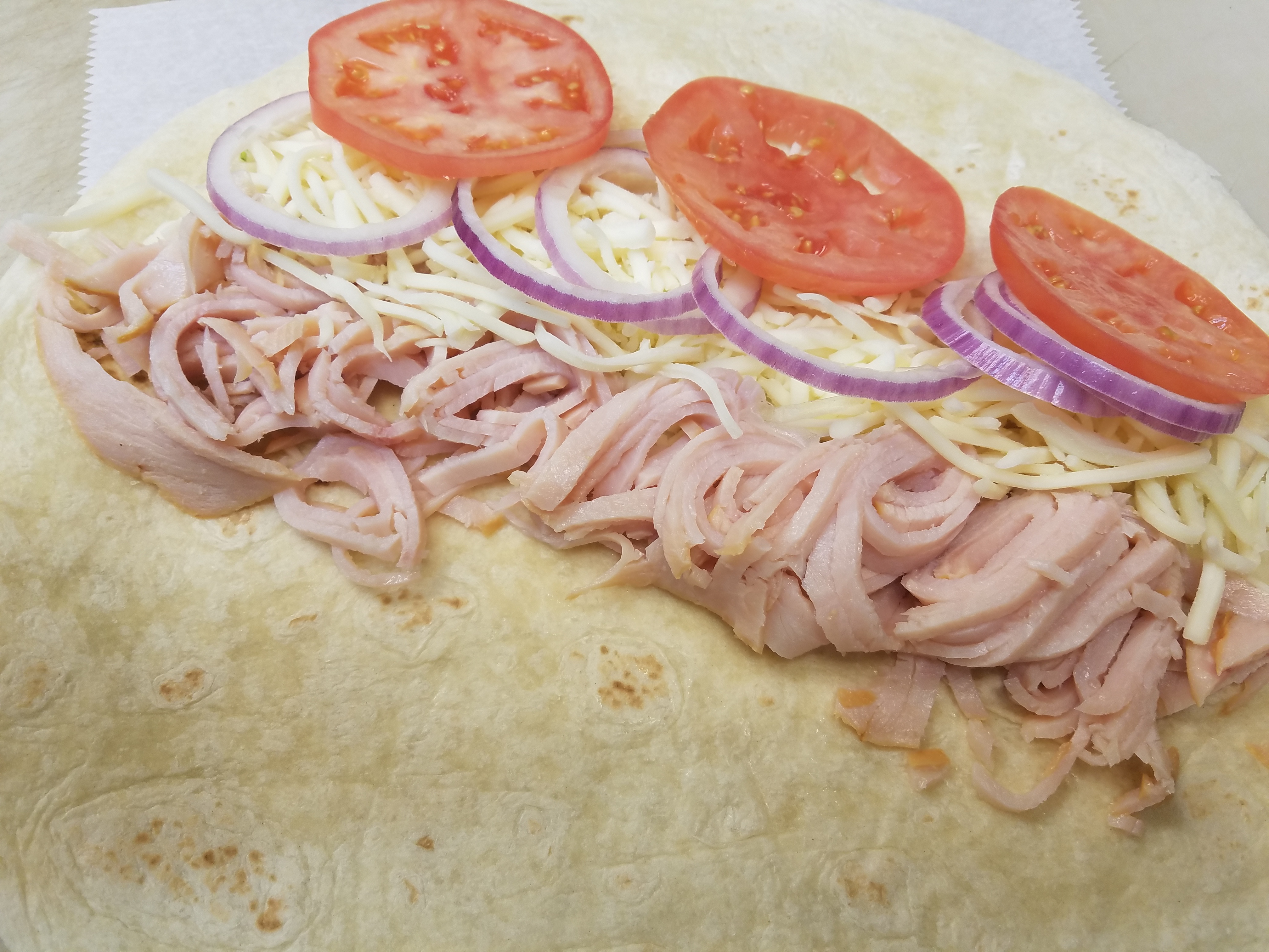 Order Turkey Wrap food online from Vinny's Pizza store, Pittsburgh on bringmethat.com
