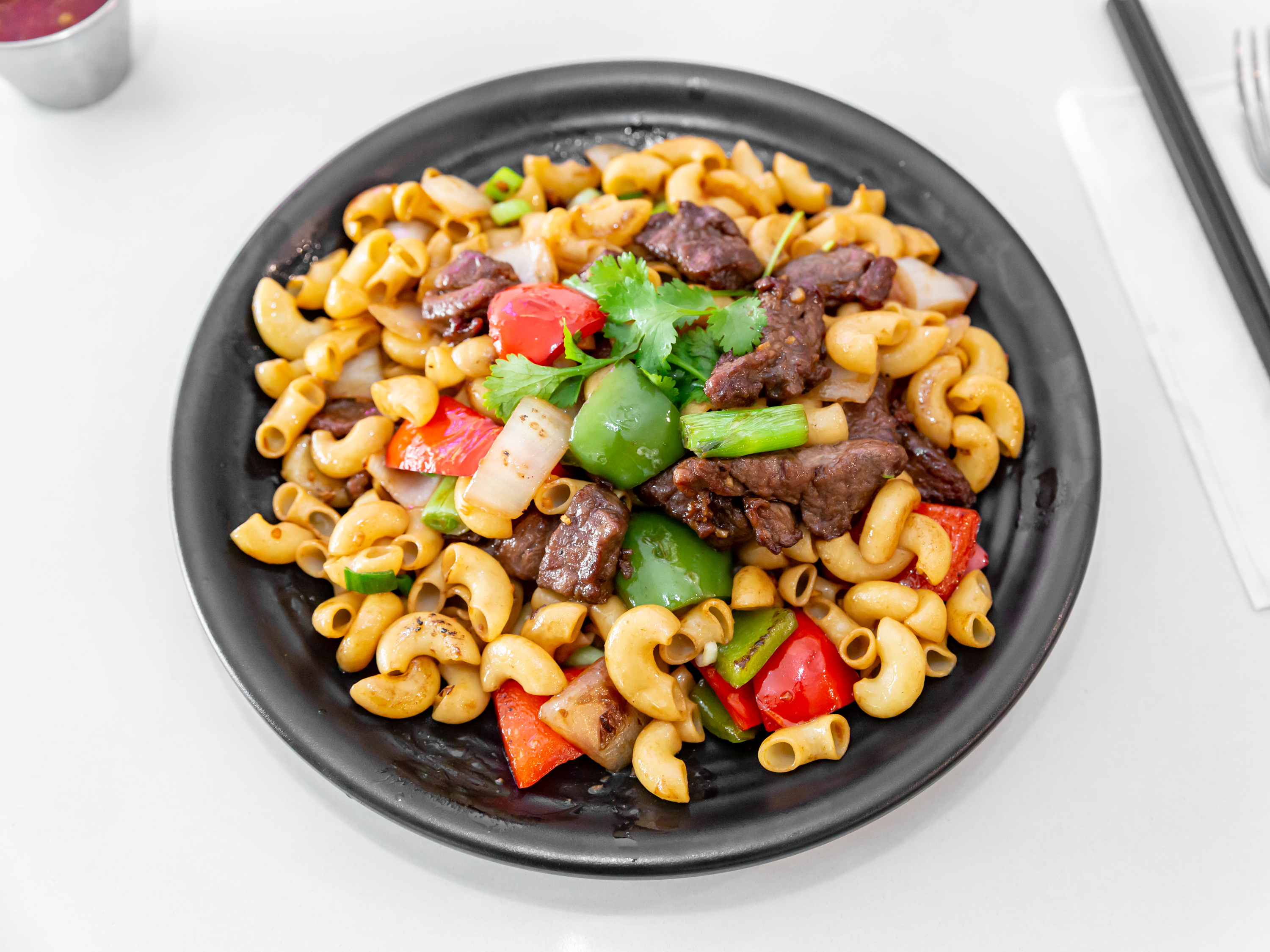 Order Shaken Beef with Macaroni food online from Culantro & Basil Pho Bistro store, West Covina on bringmethat.com