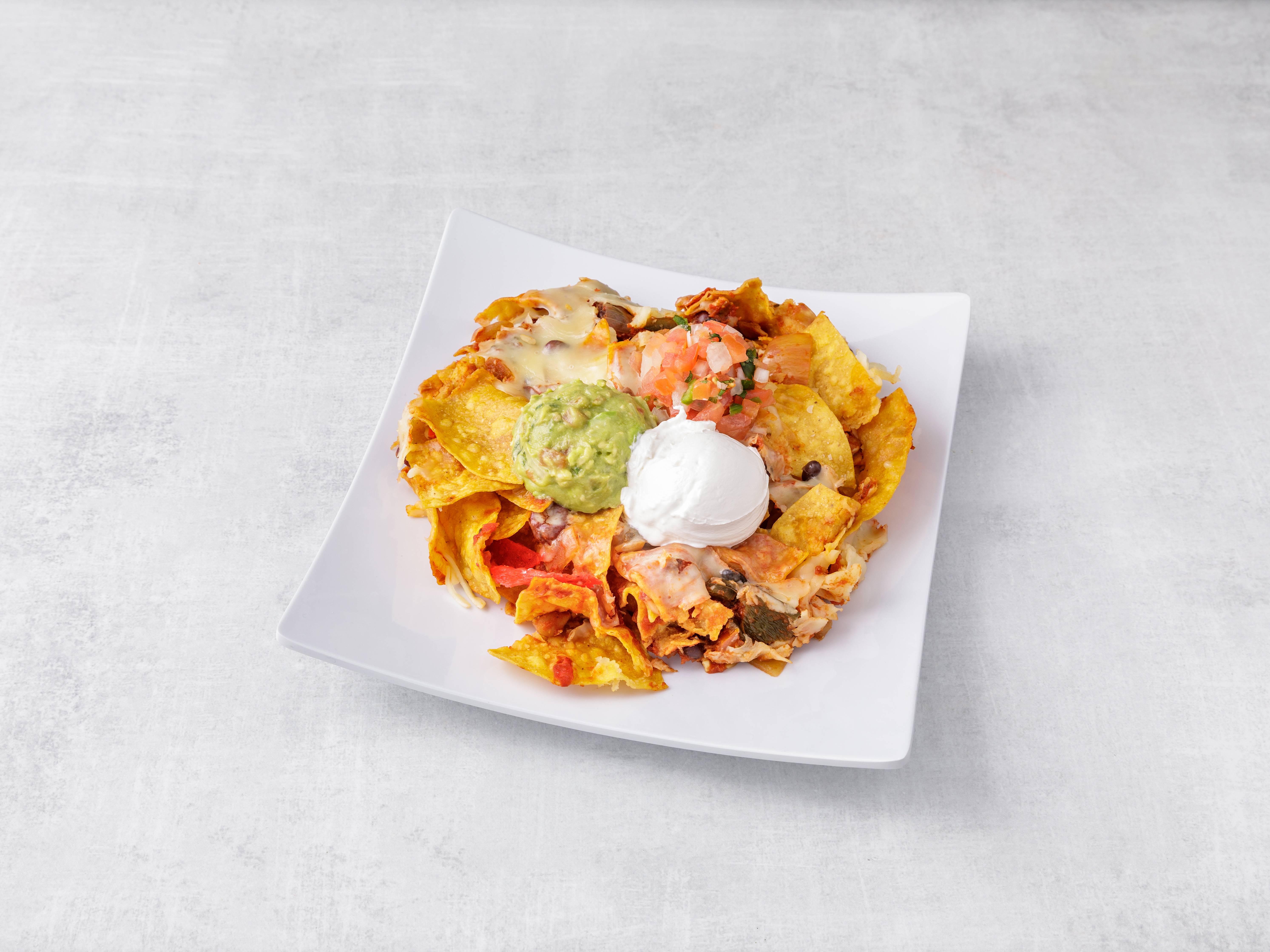 Order Nachos Grande food online from Tinga store, Westfield on bringmethat.com