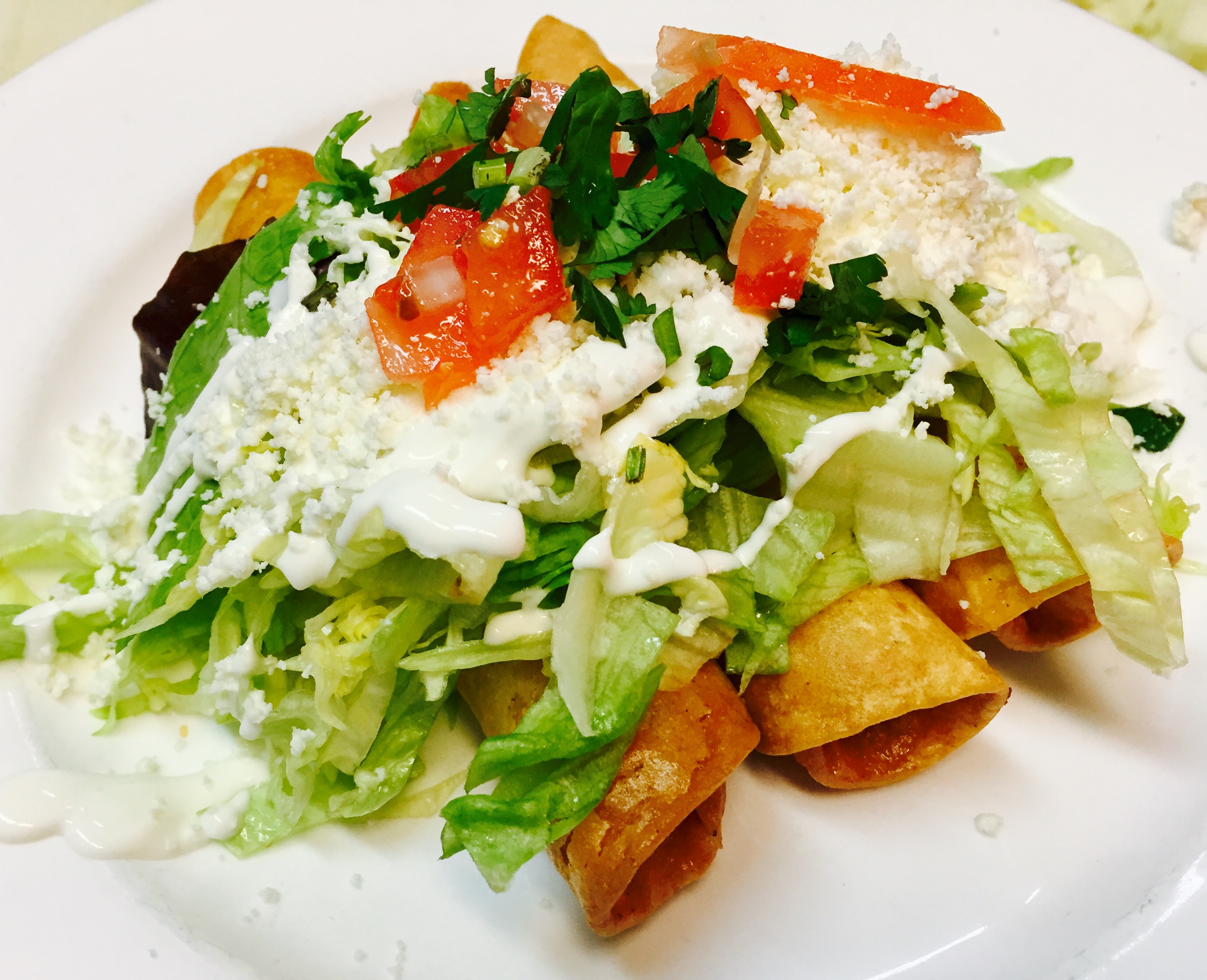 Order 3 Queso Fresco Flautas food online from Hot Jalapeno store, New York on bringmethat.com