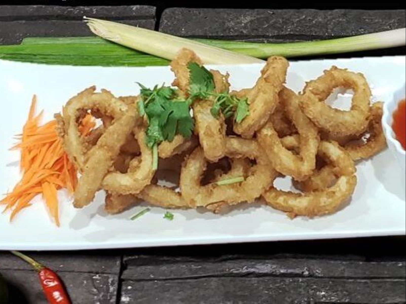 Order Fried Calamari food online from Jie Kitchen store, Las Vegas on bringmethat.com