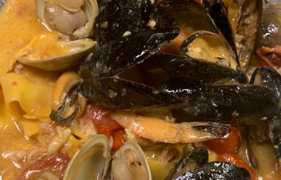 Order Seafood Pappardelle Special food online from Villa Nuova Ristorante store, Deptford Township on bringmethat.com