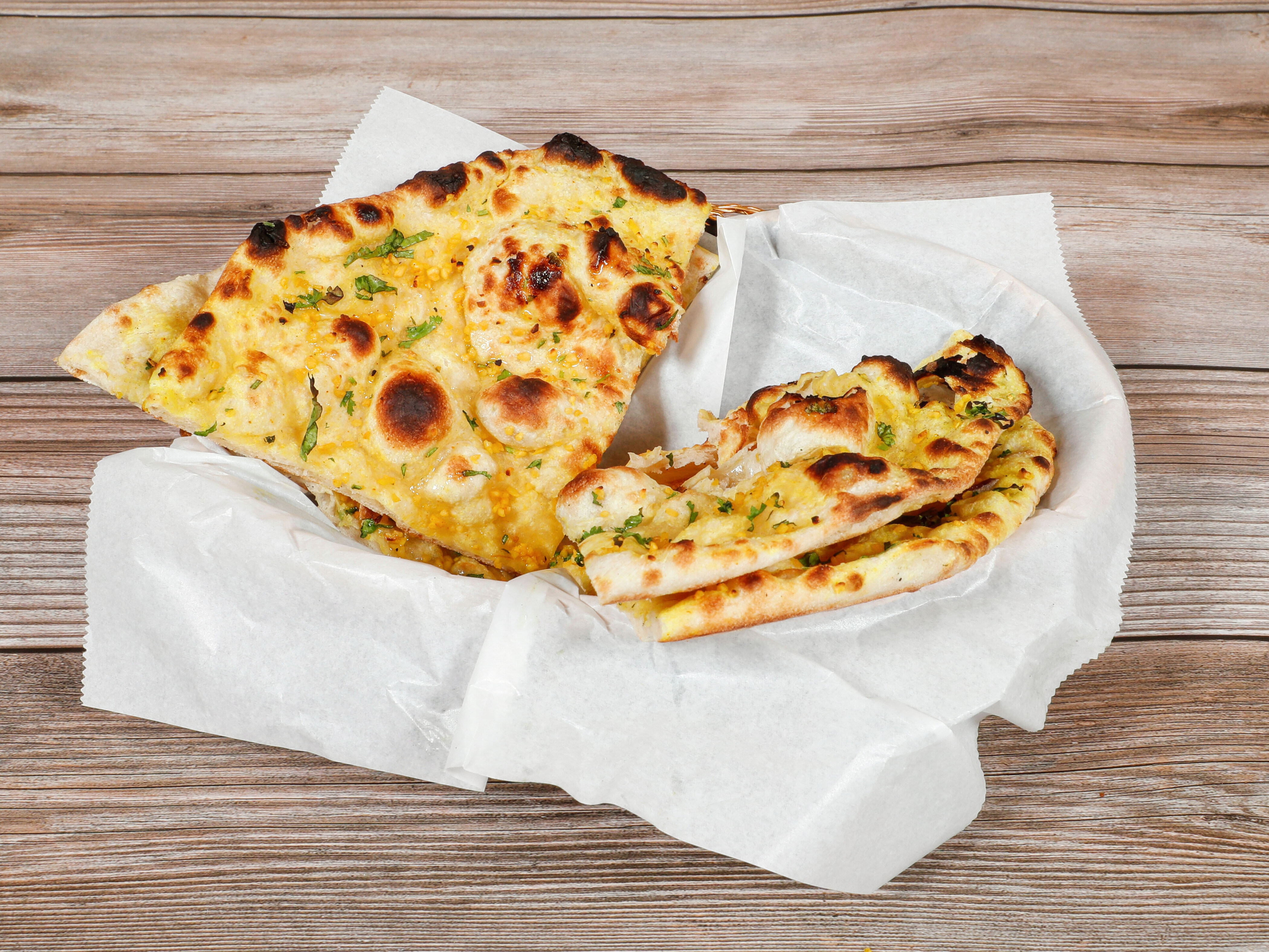 Order Garlic Naan food online from Royal Indian store, Citrus Heights on bringmethat.com