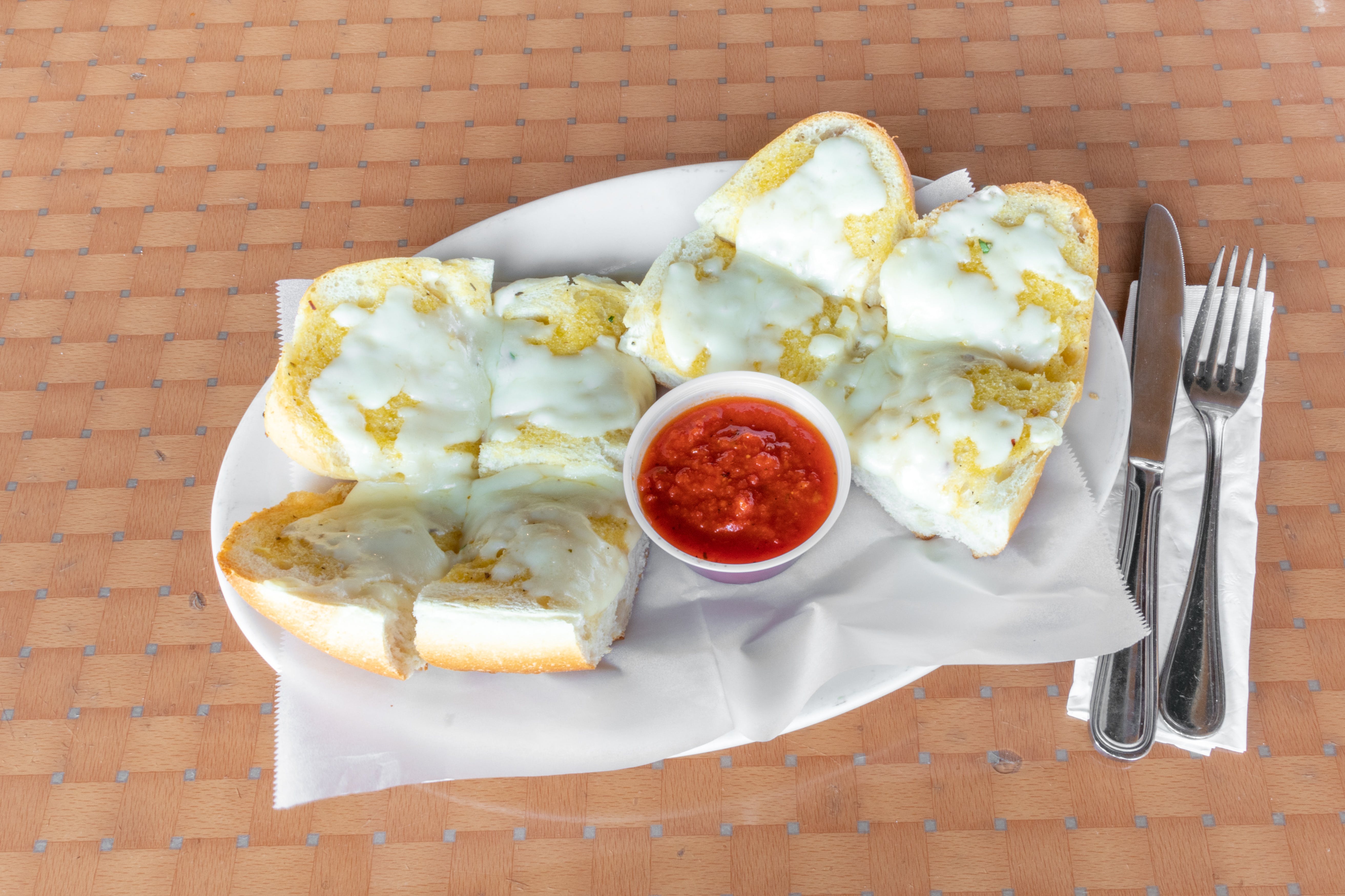 Order Garlic Bread - Appetizer food online from Guido's Pizza Parlor store, Walden on bringmethat.com