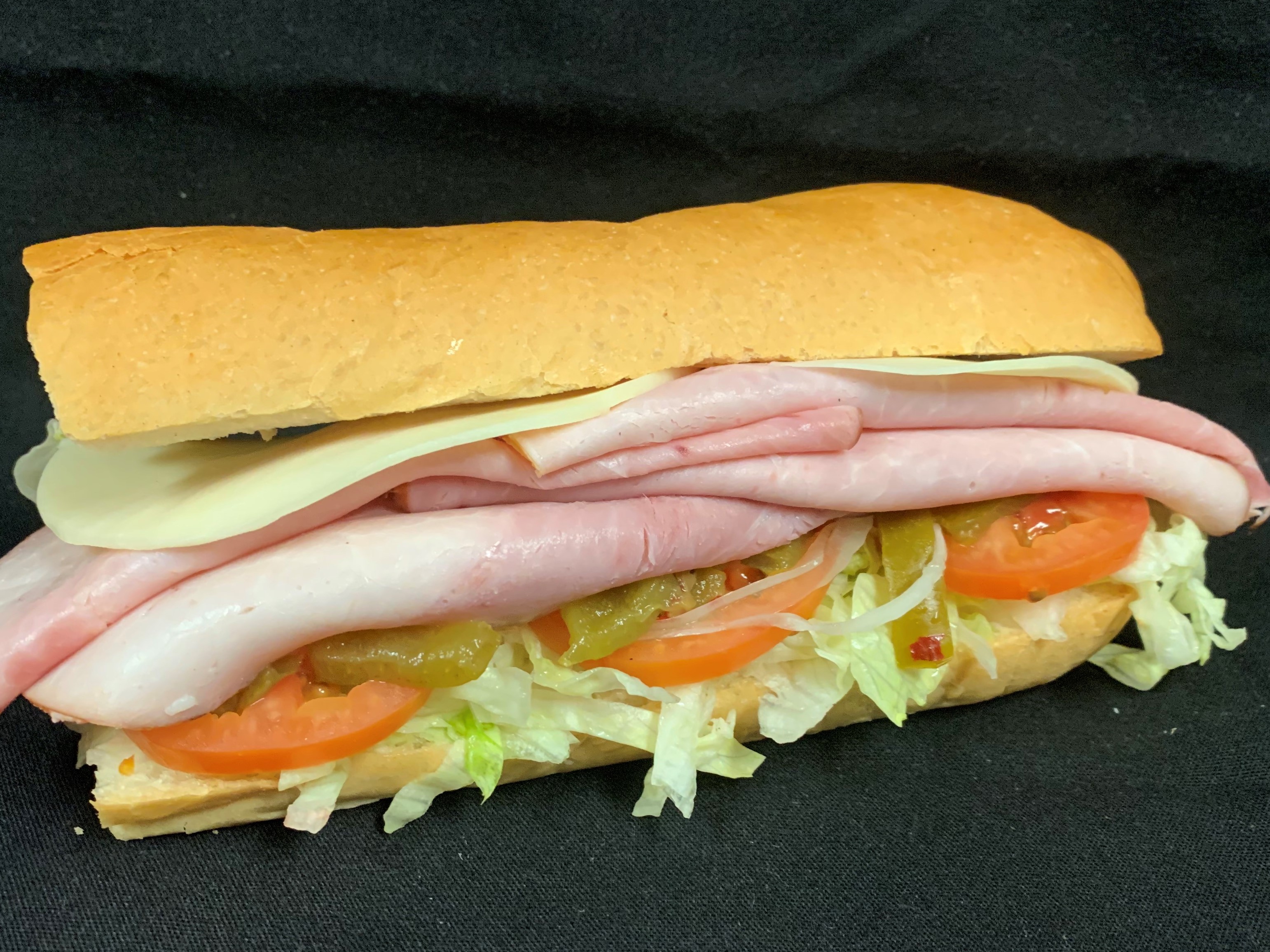 Order 4. Ham and Cheese Sub food online from Tony Subs & Pizza store, Inglewood on bringmethat.com