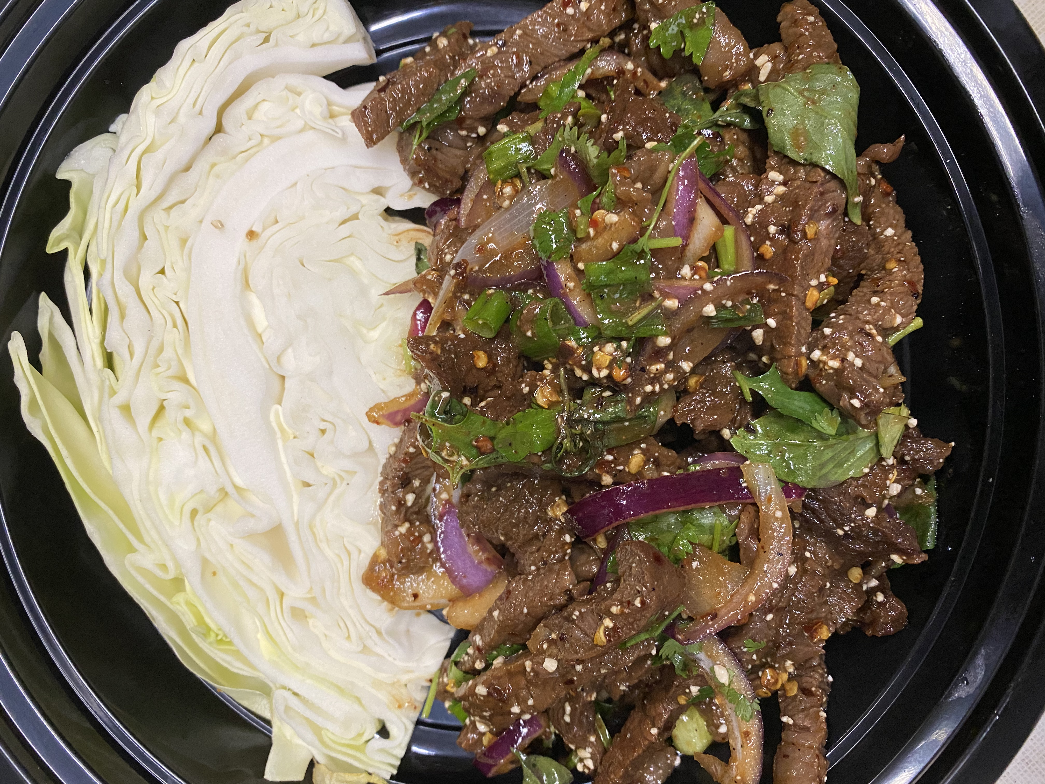 Order Spicy BBQ Beef (Nuea Num Tok) food online from Lucky Deli store, Los Angeles on bringmethat.com