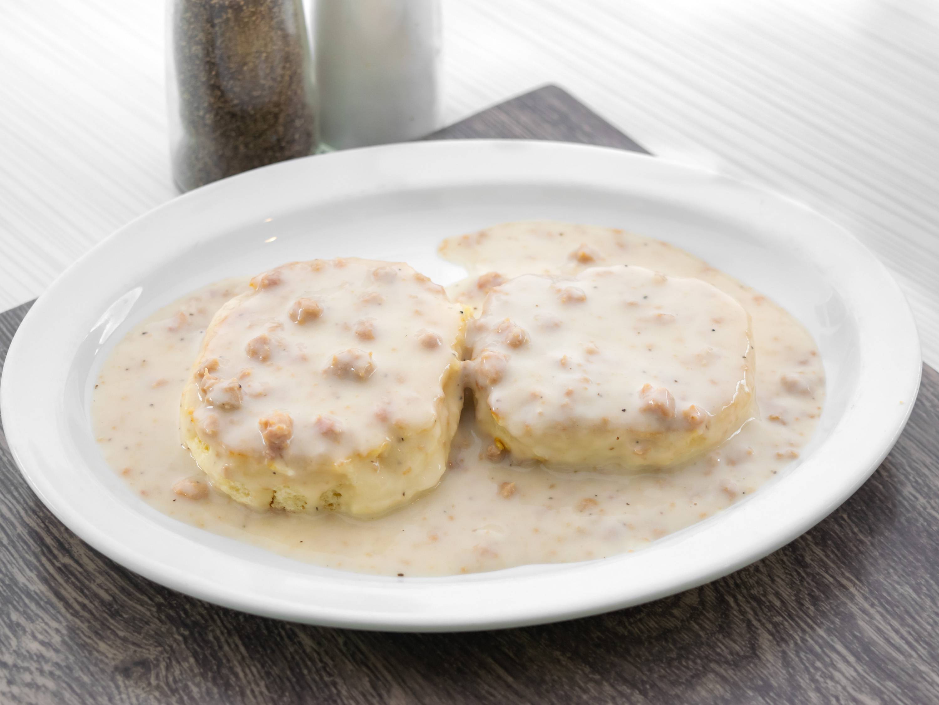 Order Biscuits and Gravy food online from Leo Coney Island On Tap (122 Oakes St Sw store, Grand Rapids on bringmethat.com