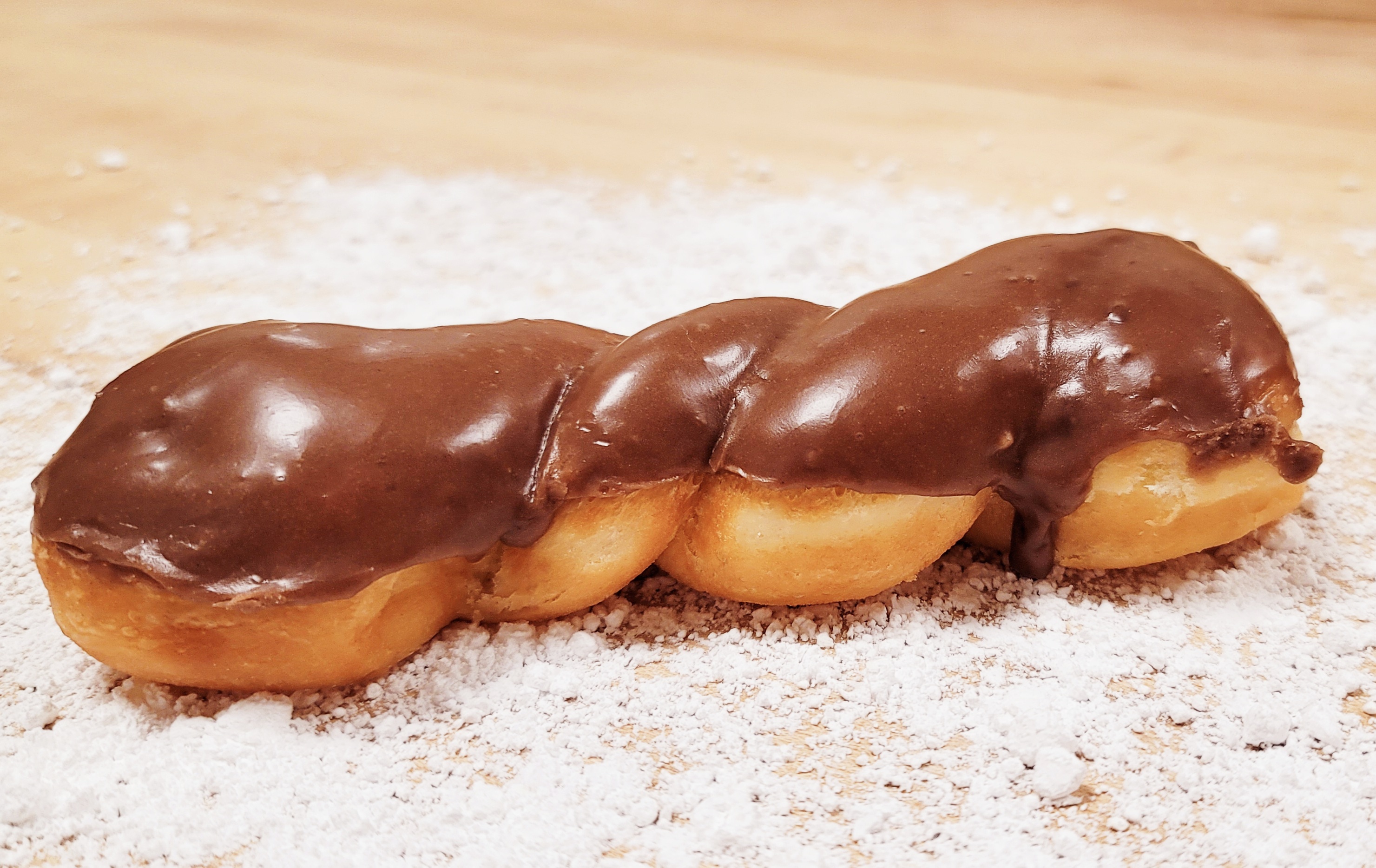 Order Chocolate Twist food online from Golden Donuts store, National City on bringmethat.com