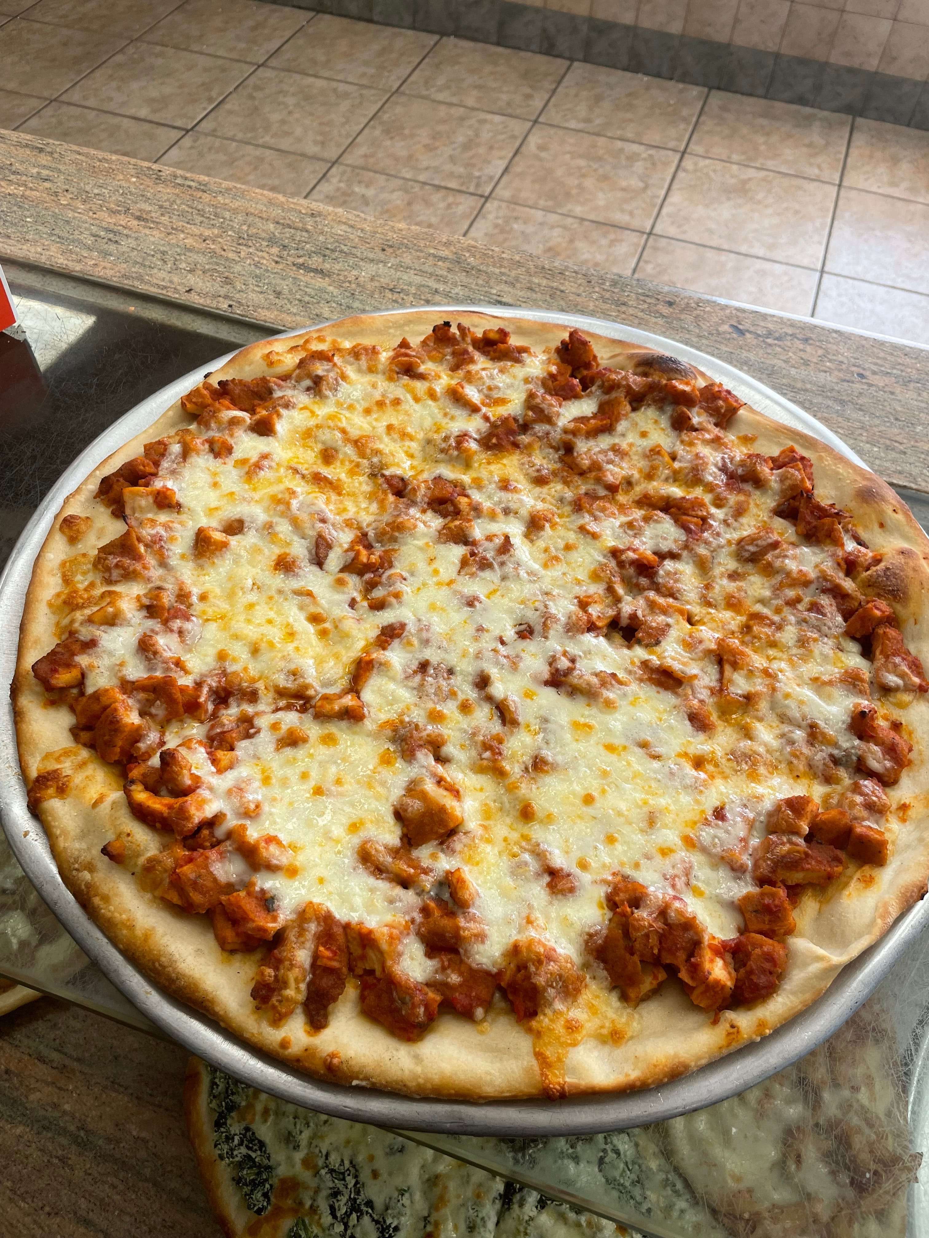 Order Chicken Parmigiana Pizza - Mini Personal food online from Regina Pizza store, Lynbrook on bringmethat.com