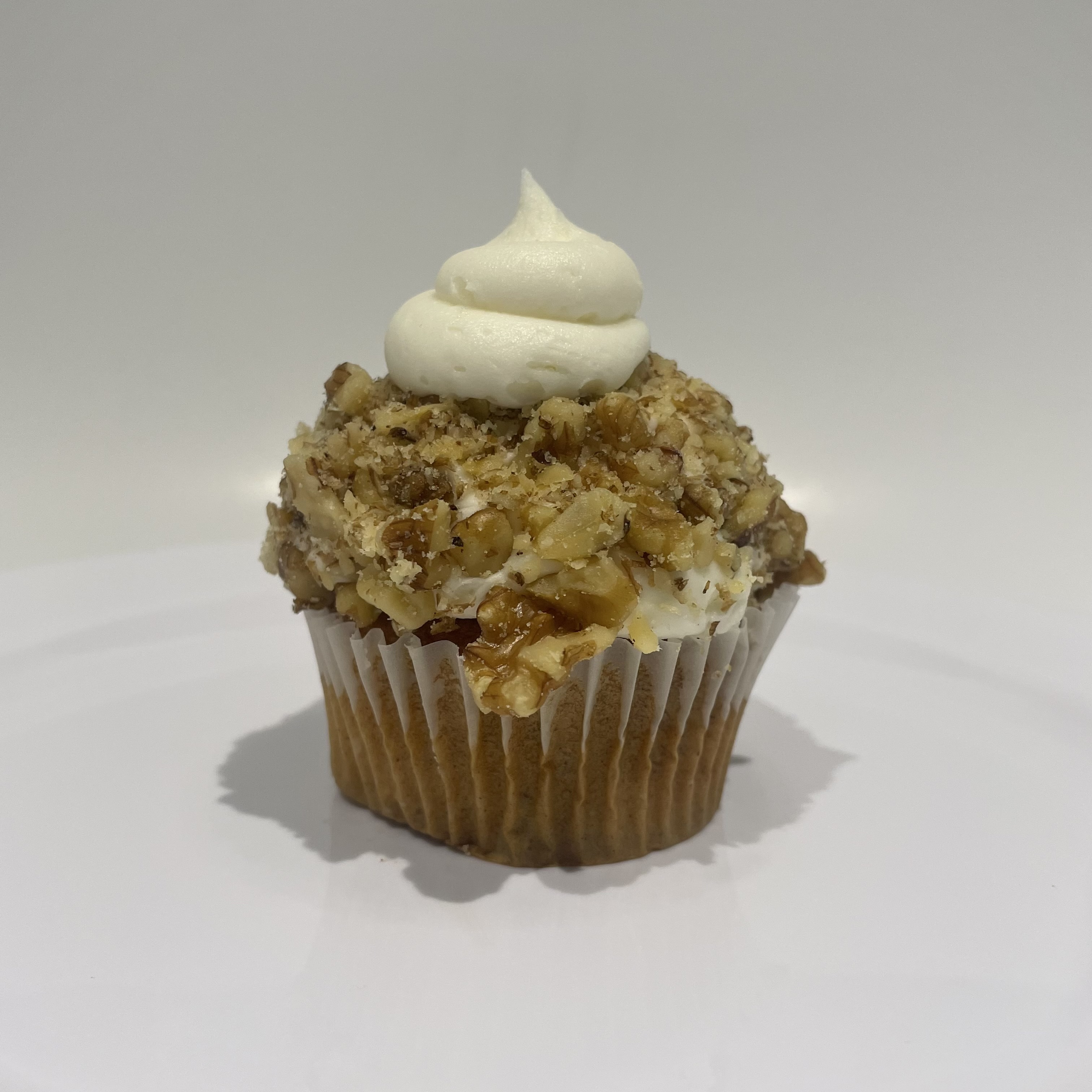 Order Carrot Cake with Nuts food online from The House of Cupcakes store, Princeton on bringmethat.com