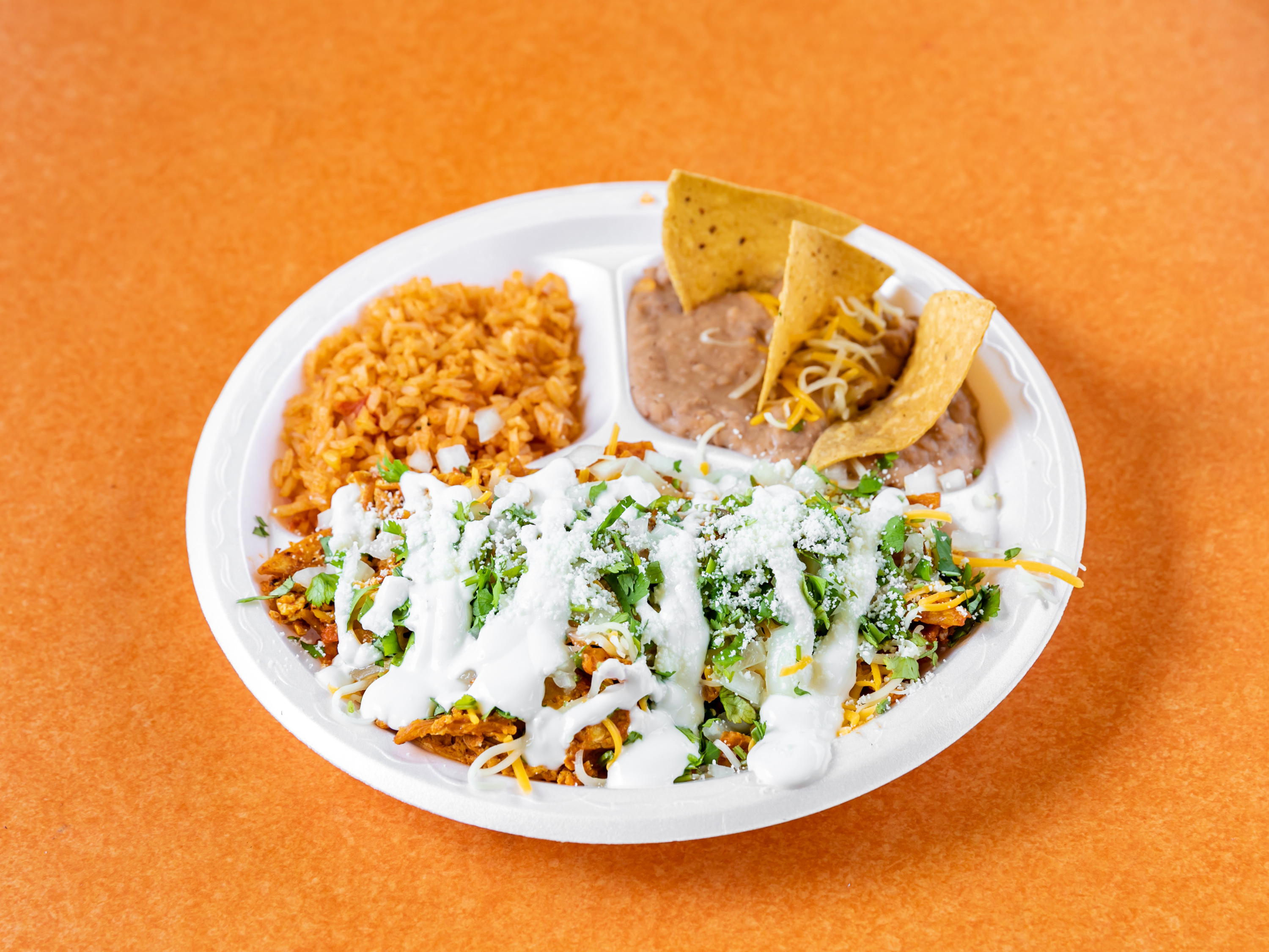 Order Chilaquiles con Huevo Breakfast Plate food online from Chamoy Tacos & Fruit store, Poway on bringmethat.com